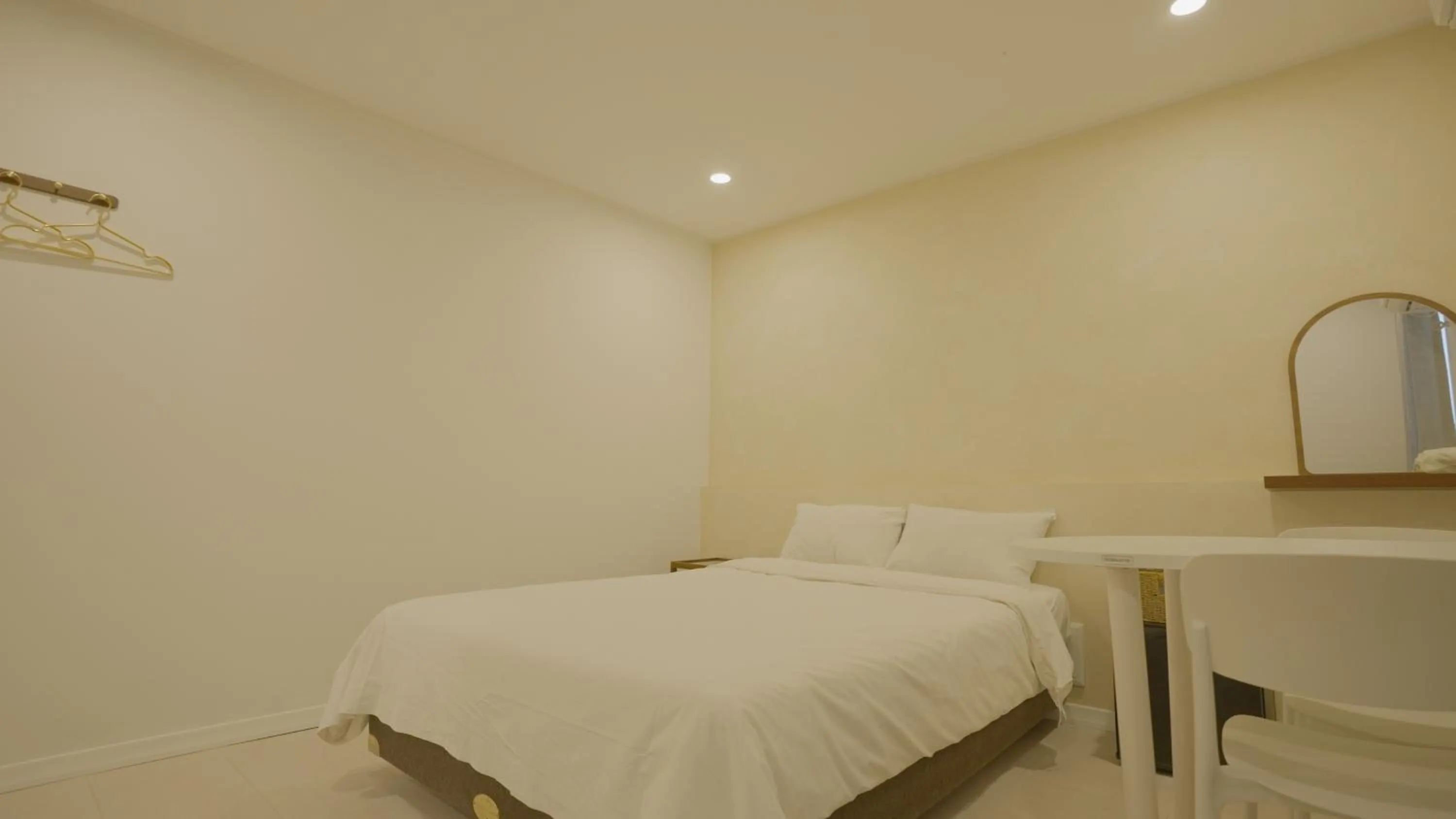 Bed in Jeju Stay Hotel