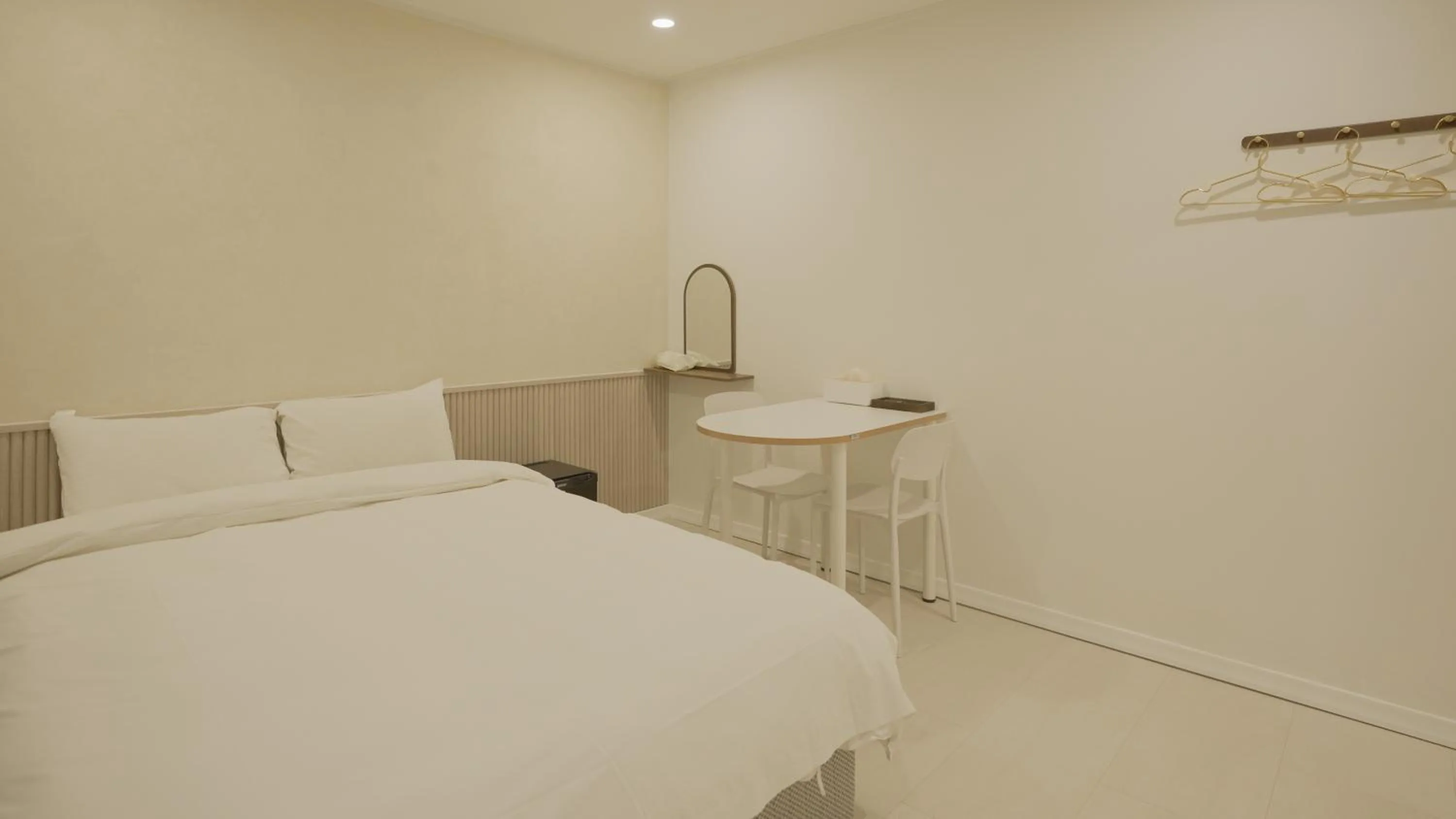 Bed in Jeju Stay Hotel