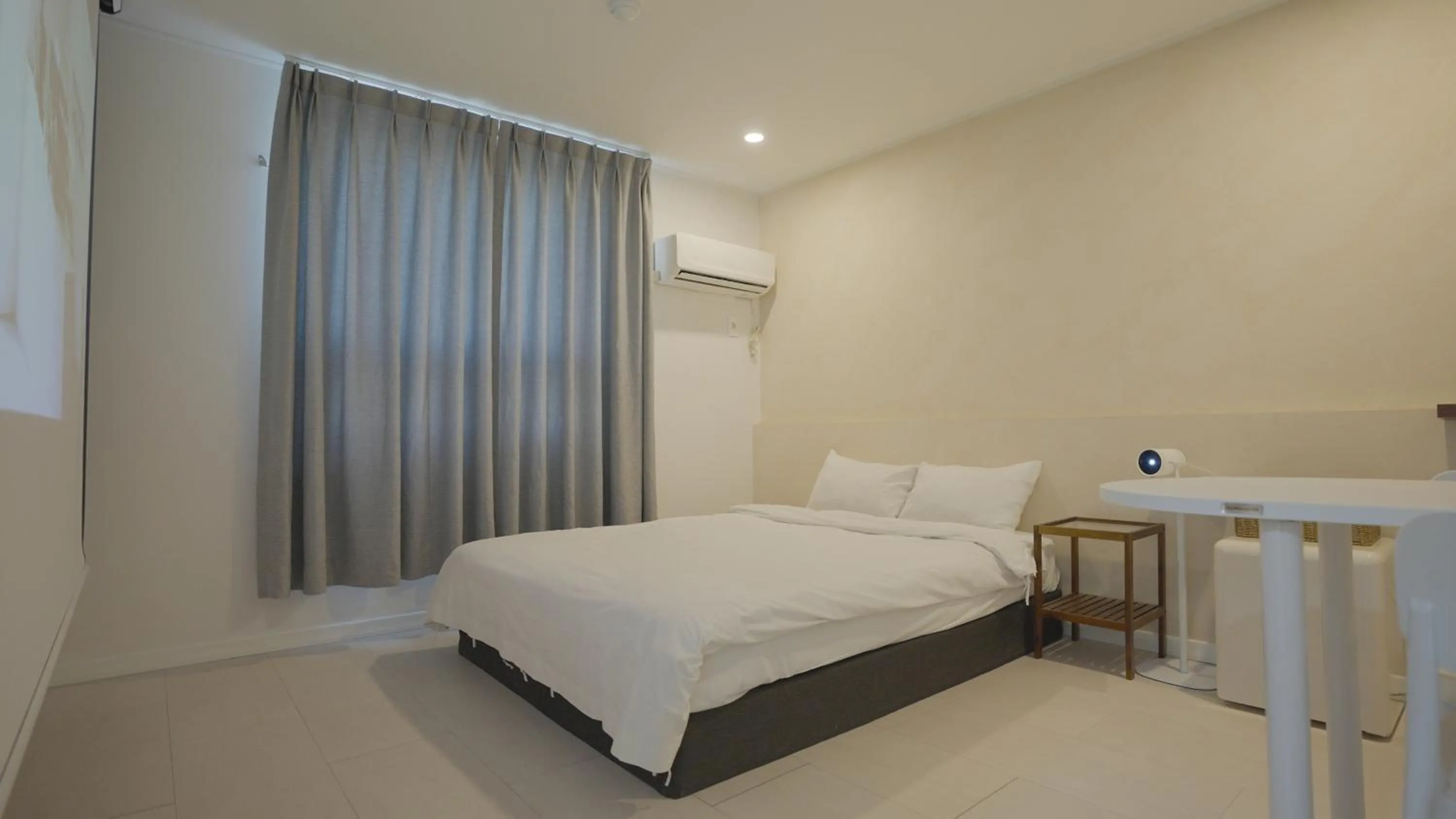 Bed in Jeju Stay Hotel