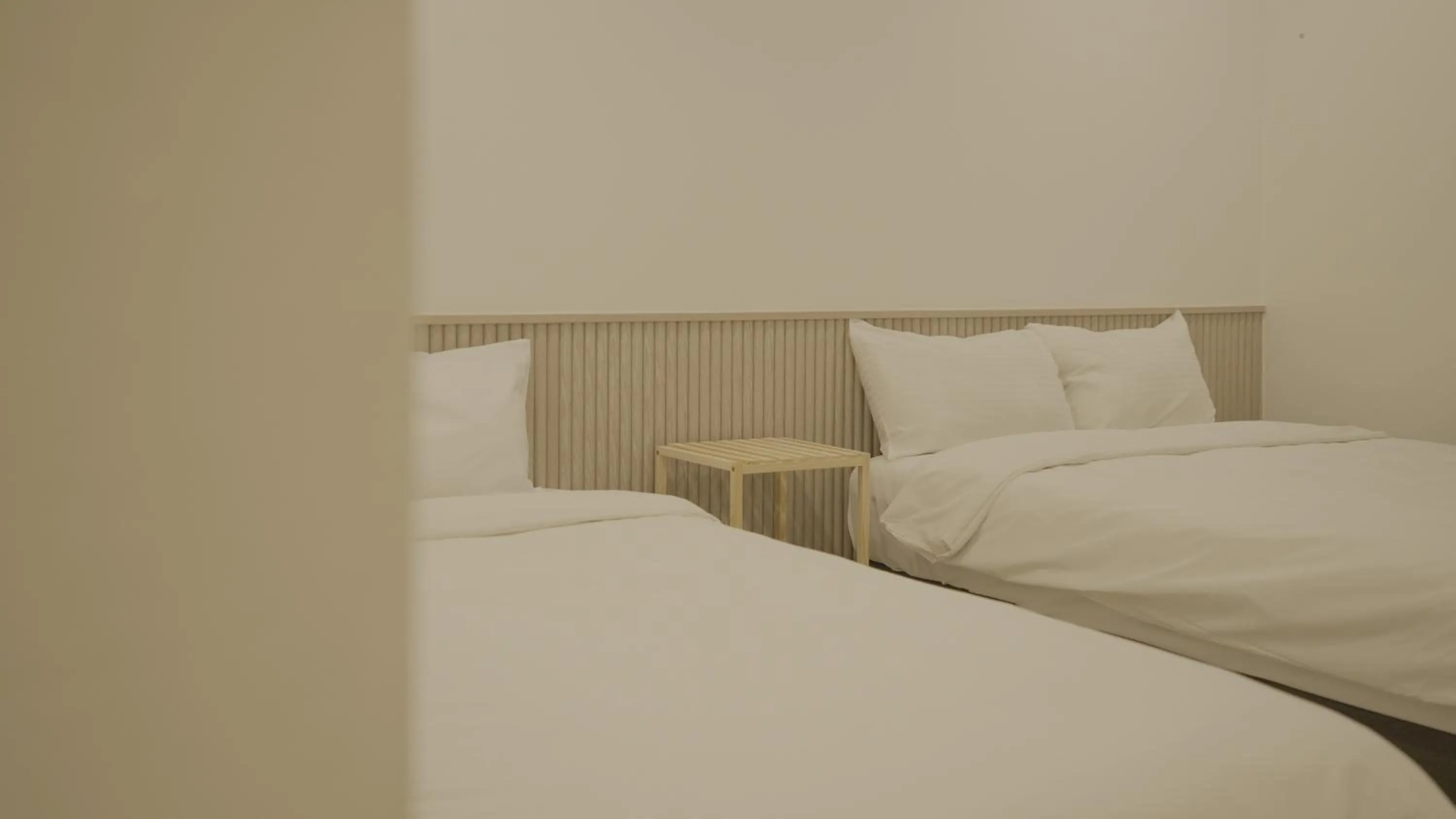 Bed in Jeju Stay Hotel