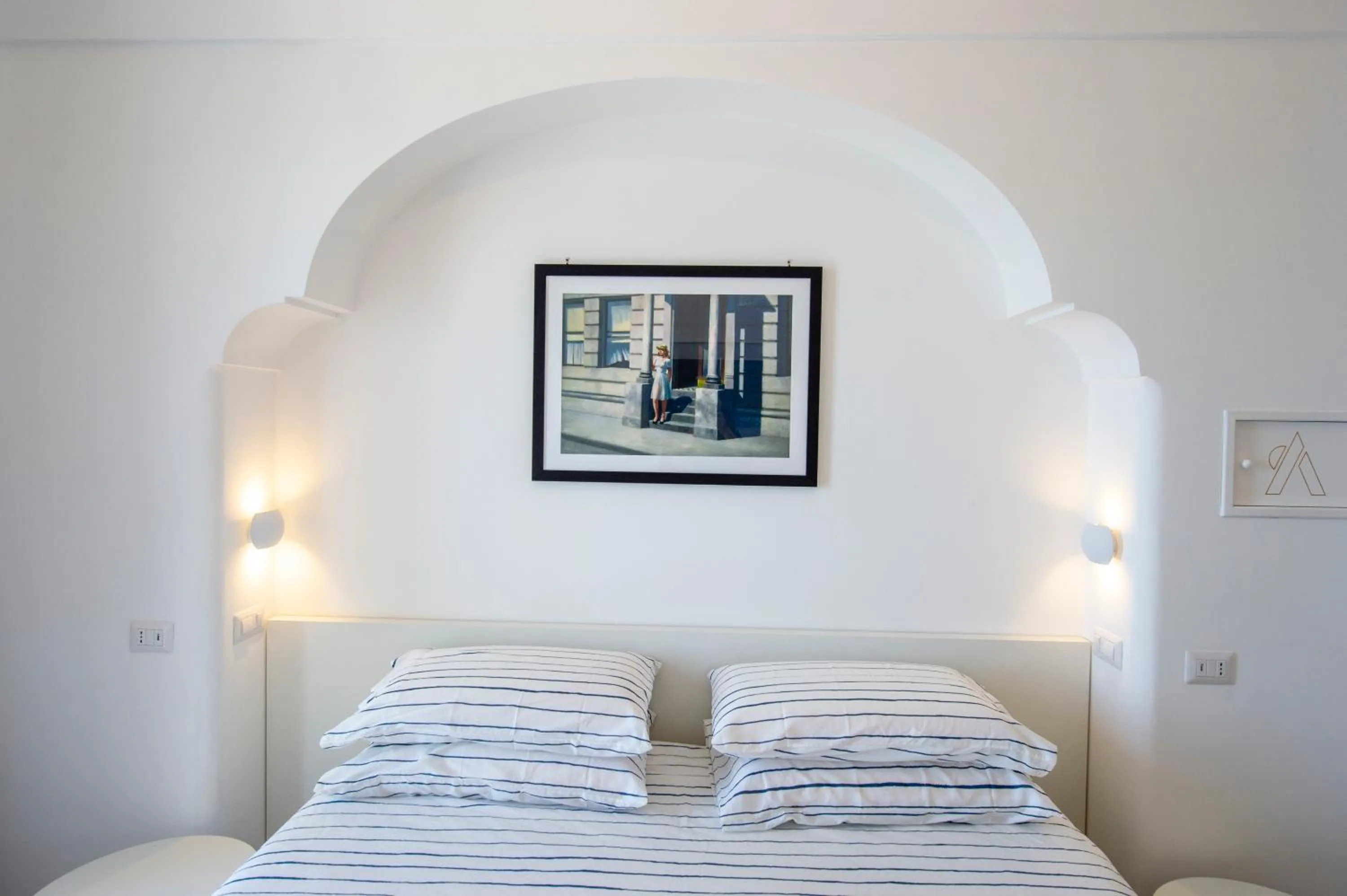 Bed in Albadamare Boutique Hotel