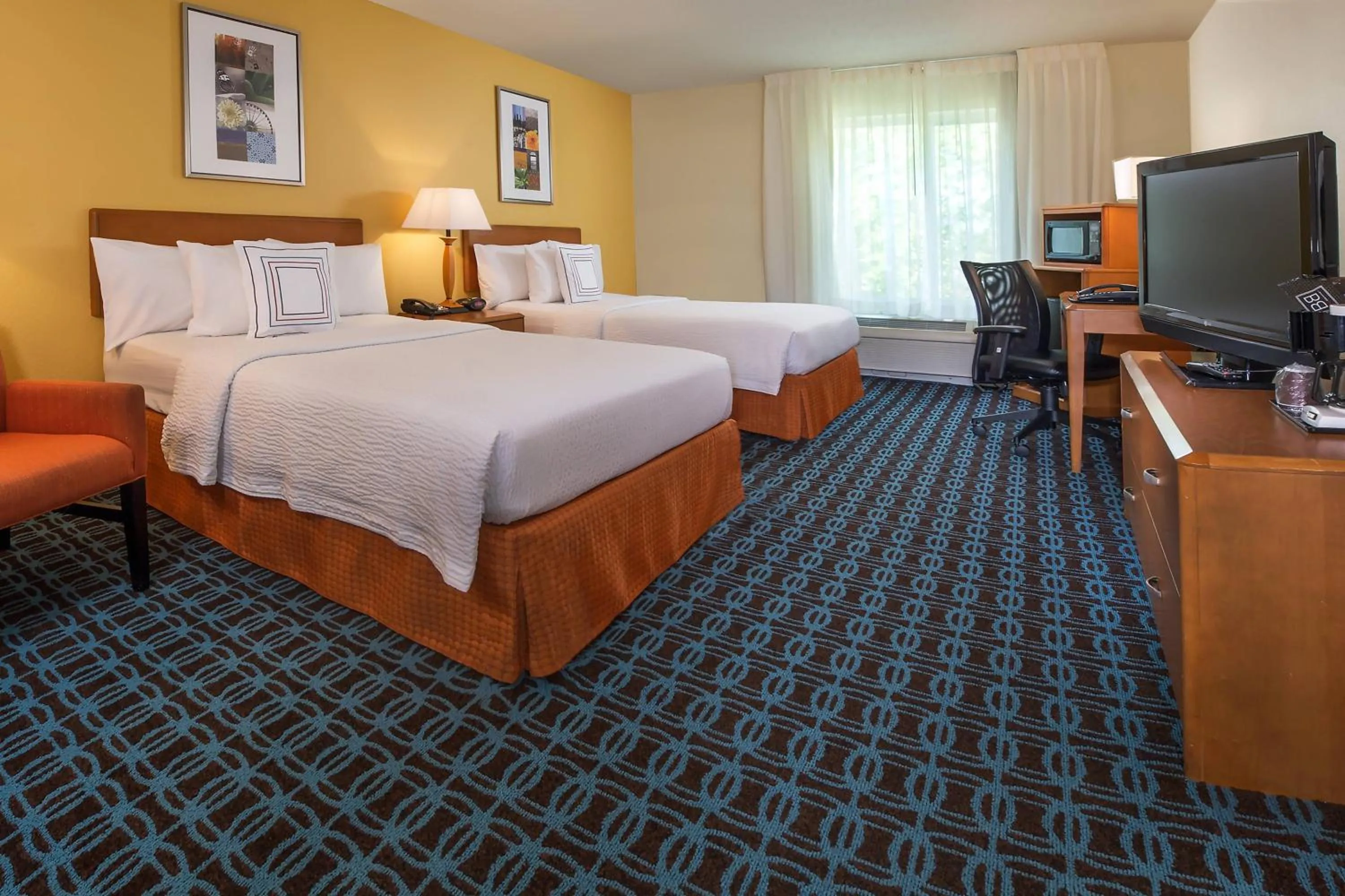 Photo of the whole room, Bed in Fairfield Inn and Suites Wilson