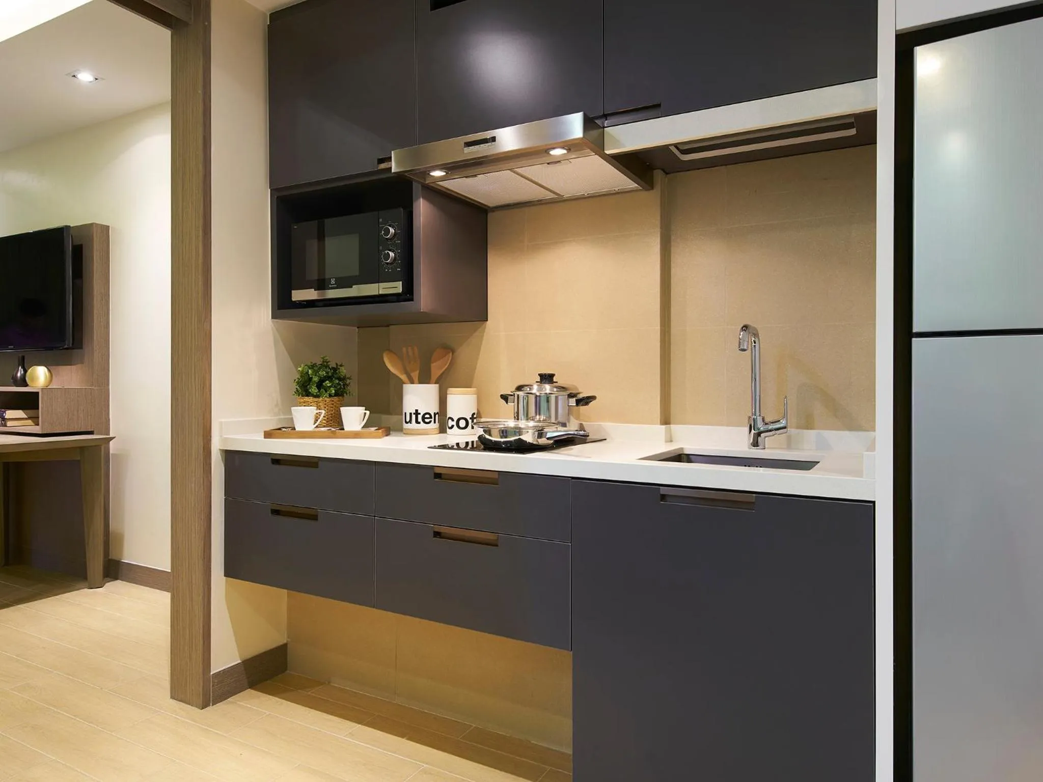 Kitchen or kitchenette in Oasia Residence Singapore by Far East Hospitality