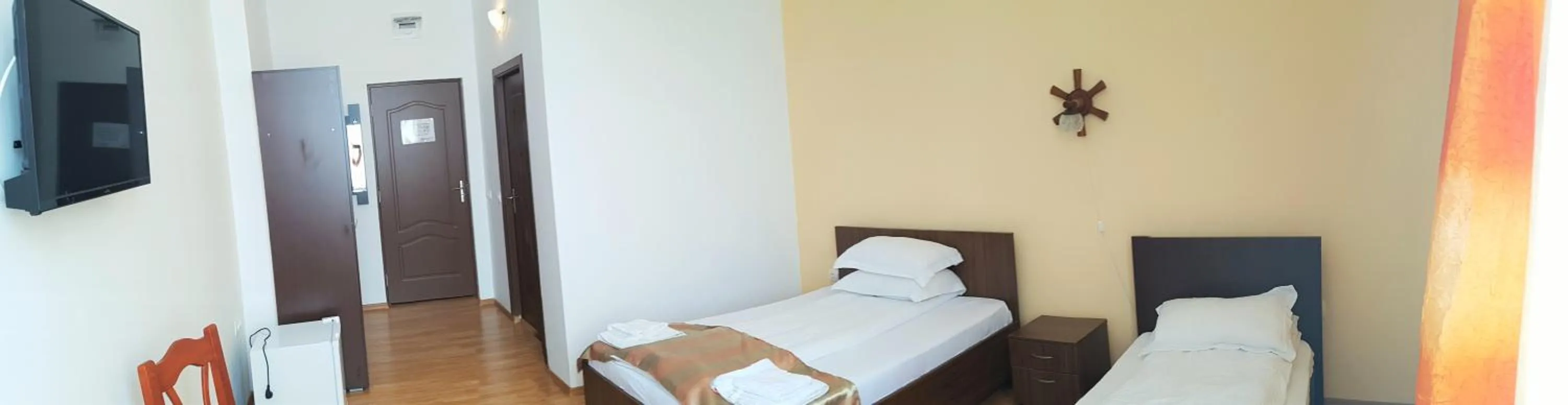 Photo of the whole room, Bed in Pensiunea Muresul