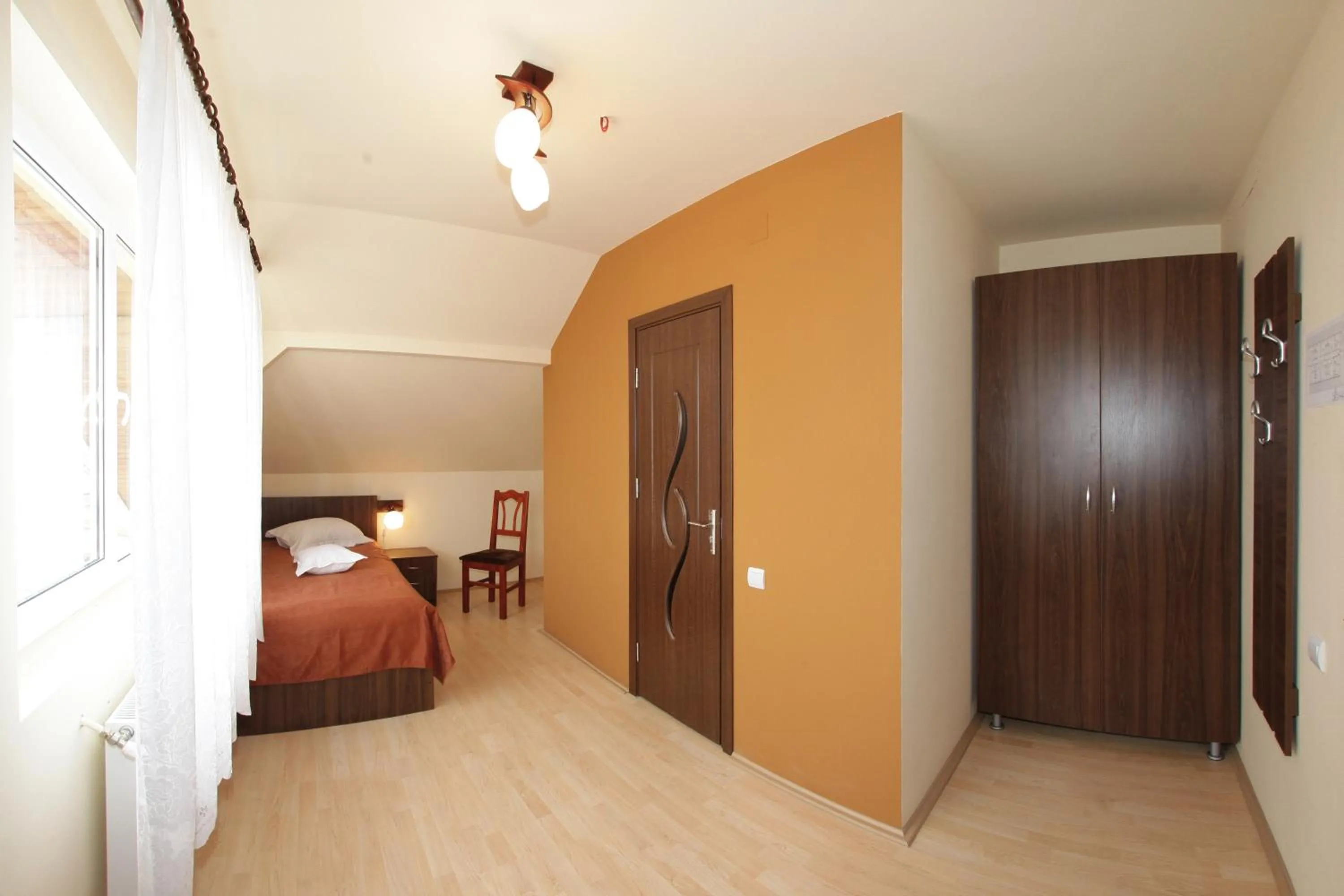 Photo of the whole room, Bed in Pensiunea Muresul