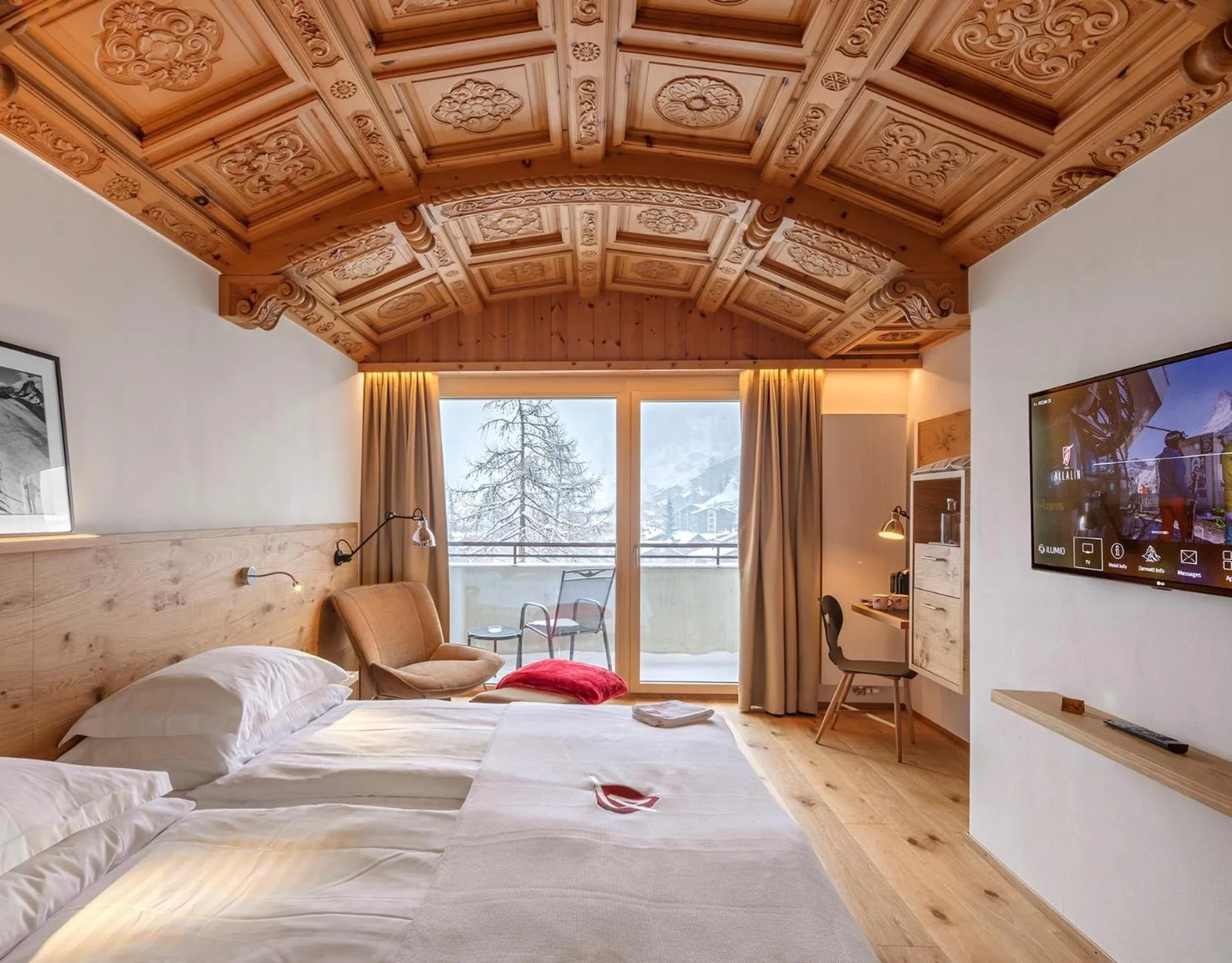 Photo of the whole room, Bed in Swiss Alpine Hotel Allalin