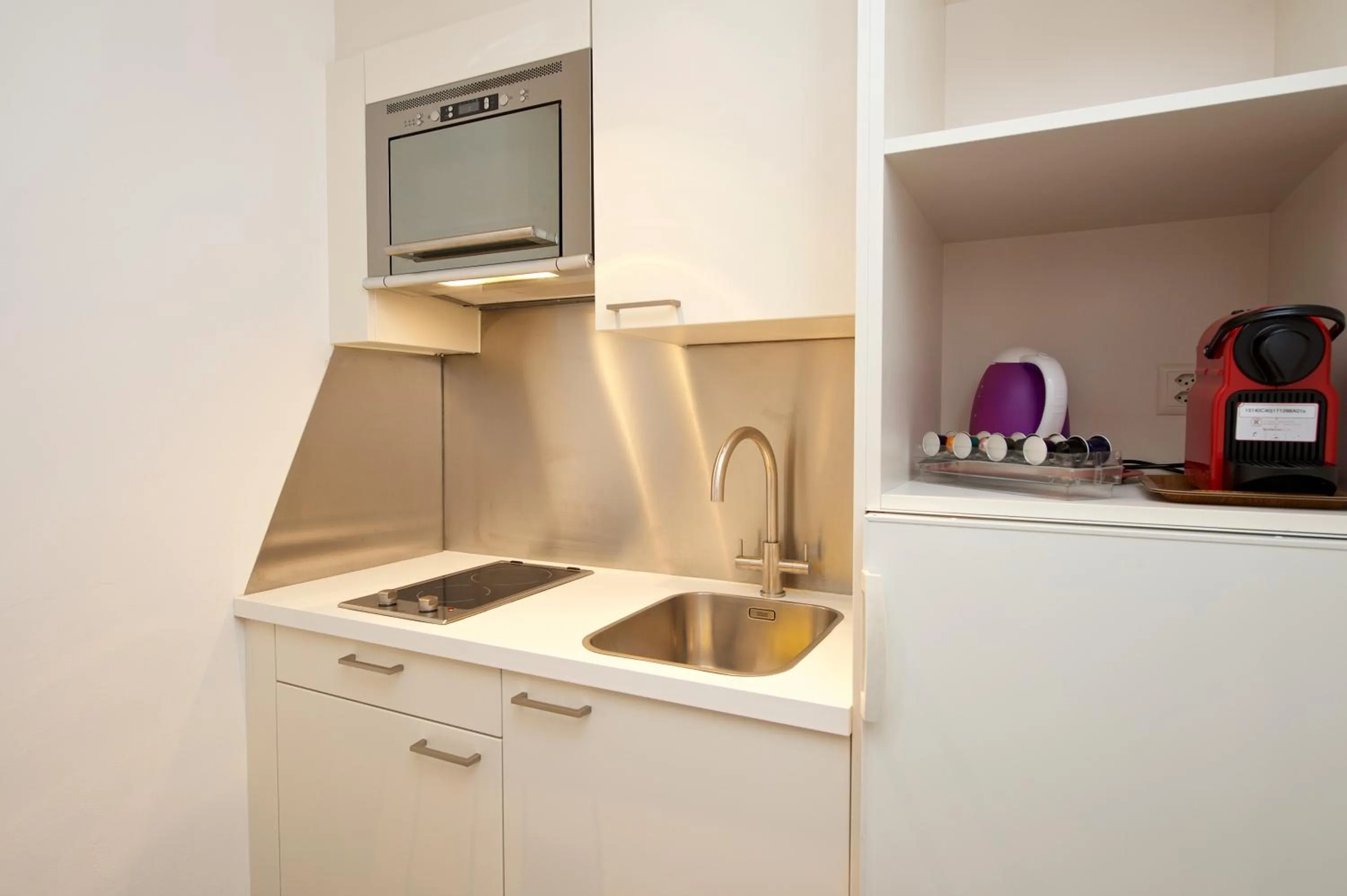 Kitchen or kitchenette in Arca Aparthotel & Spa