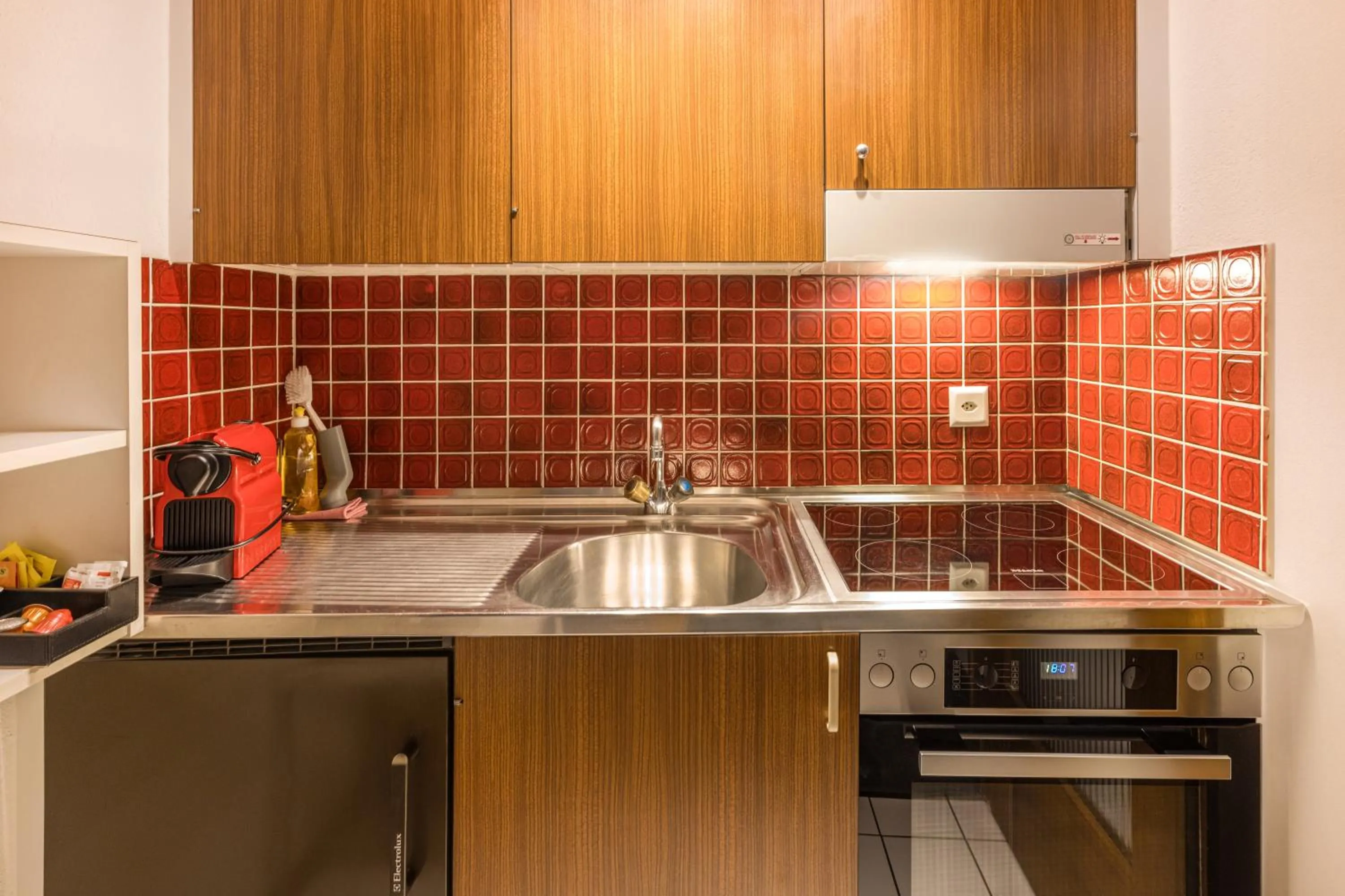 Kitchen or kitchenette in Arca Aparthotel & Spa