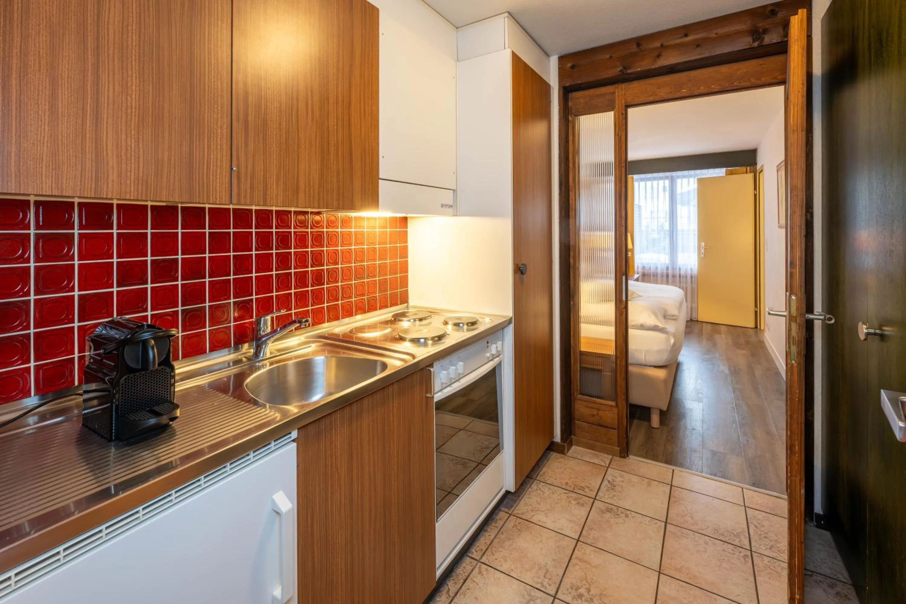 Kitchen or kitchenette in Arca Aparthotel & Spa