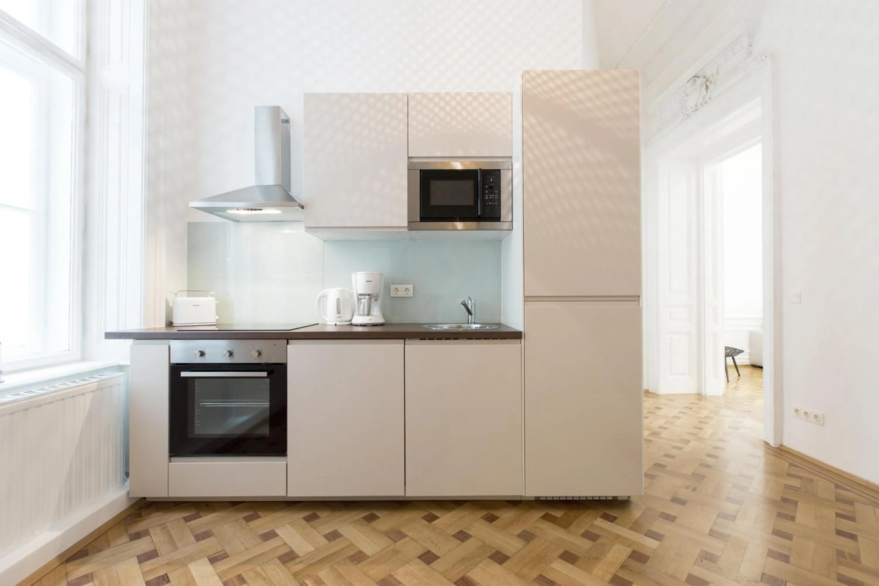 Kitchen or kitchenette in HeyMi Apartments in City Center