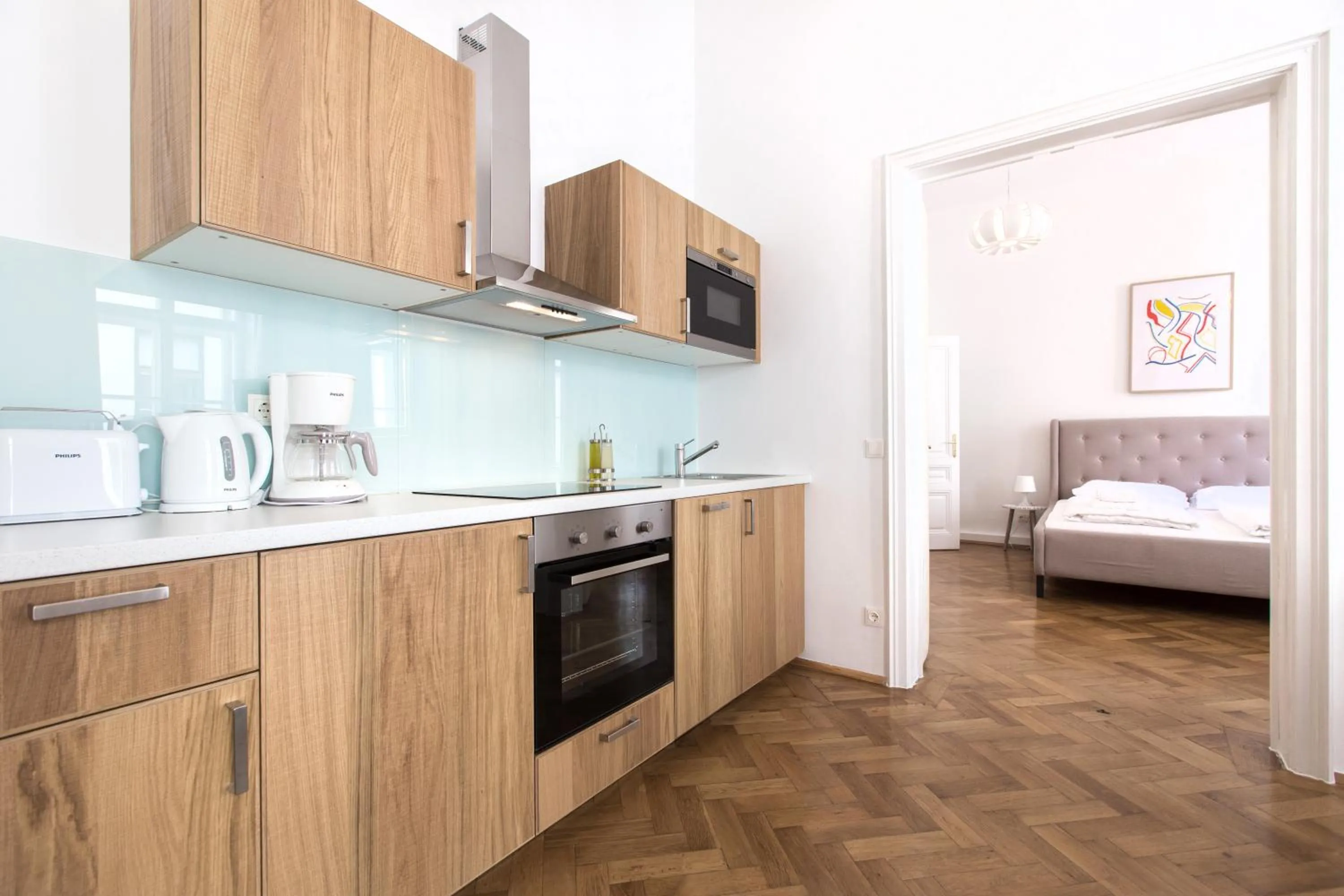Kitchen or kitchenette, Bed in HeyMi Apartments in City Center