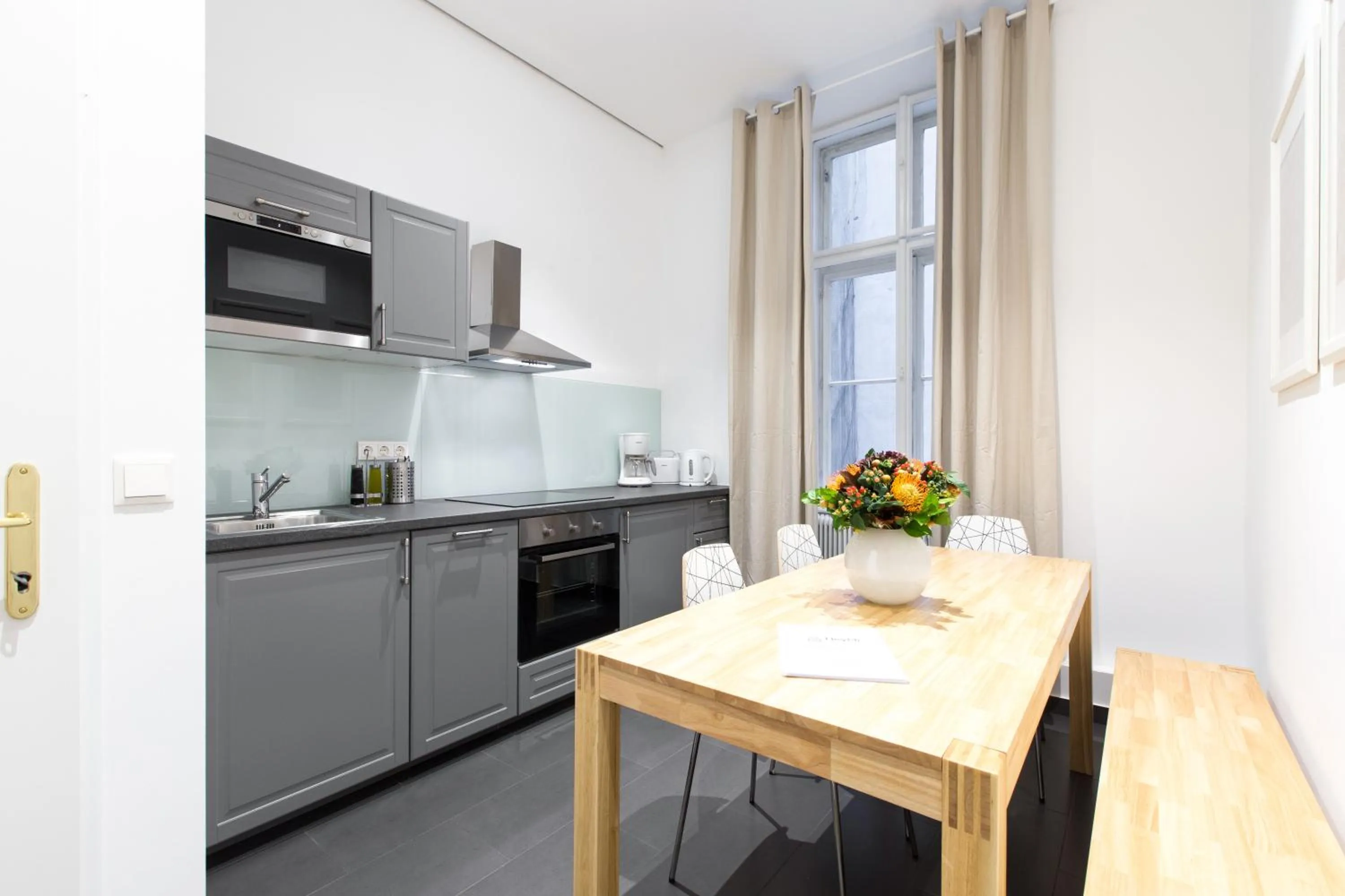 Kitchen or kitchenette in HeyMi Apartments in City Center
