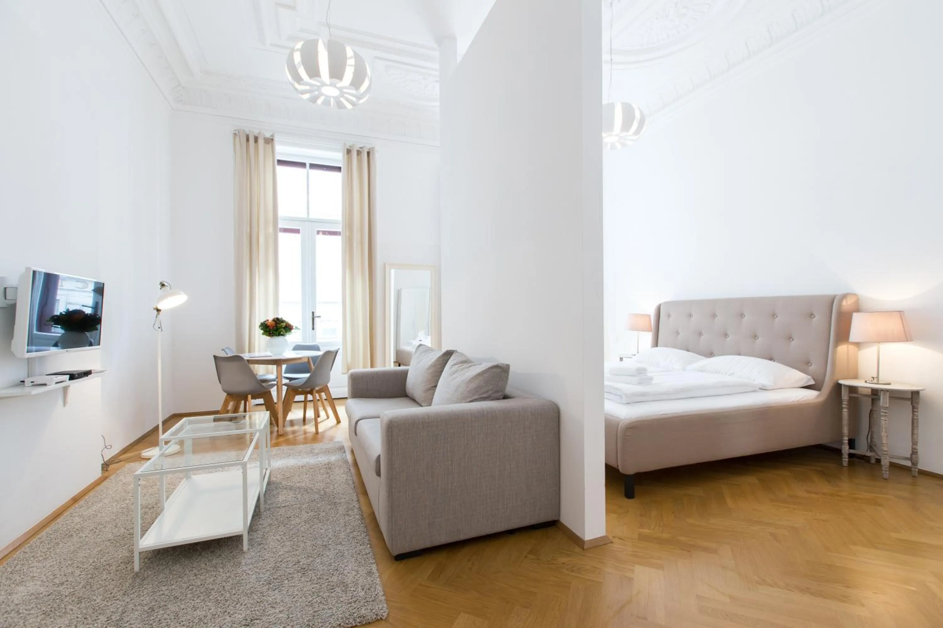 Photo of the whole room, Bed in HeyMi Apartments in City Center