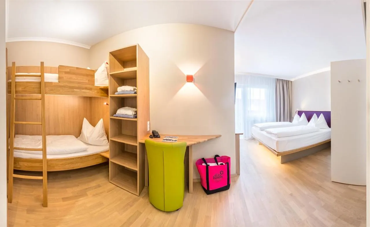 Bed in All in Red Thermenhotel