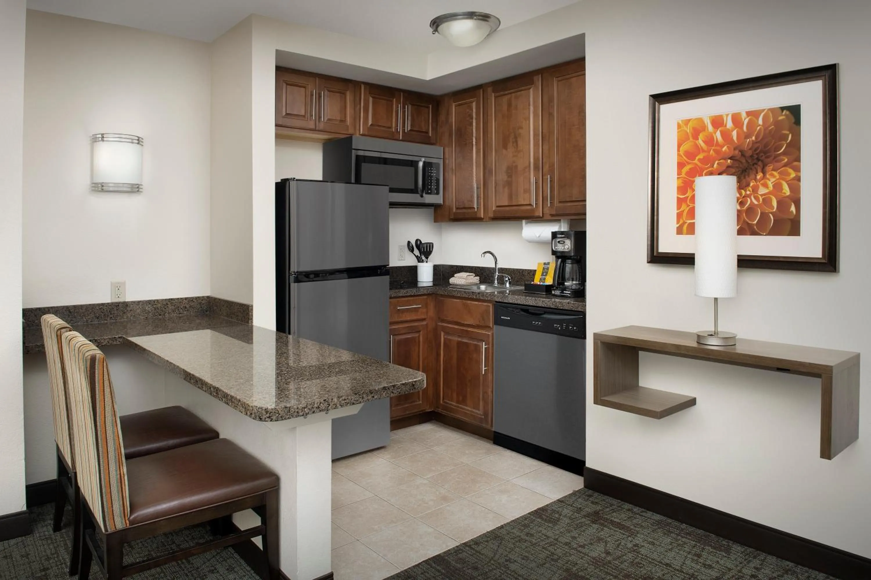 Kitchen or kitchenette in Staybridge Suites Greenville I-85 Woodruff Road by IHG