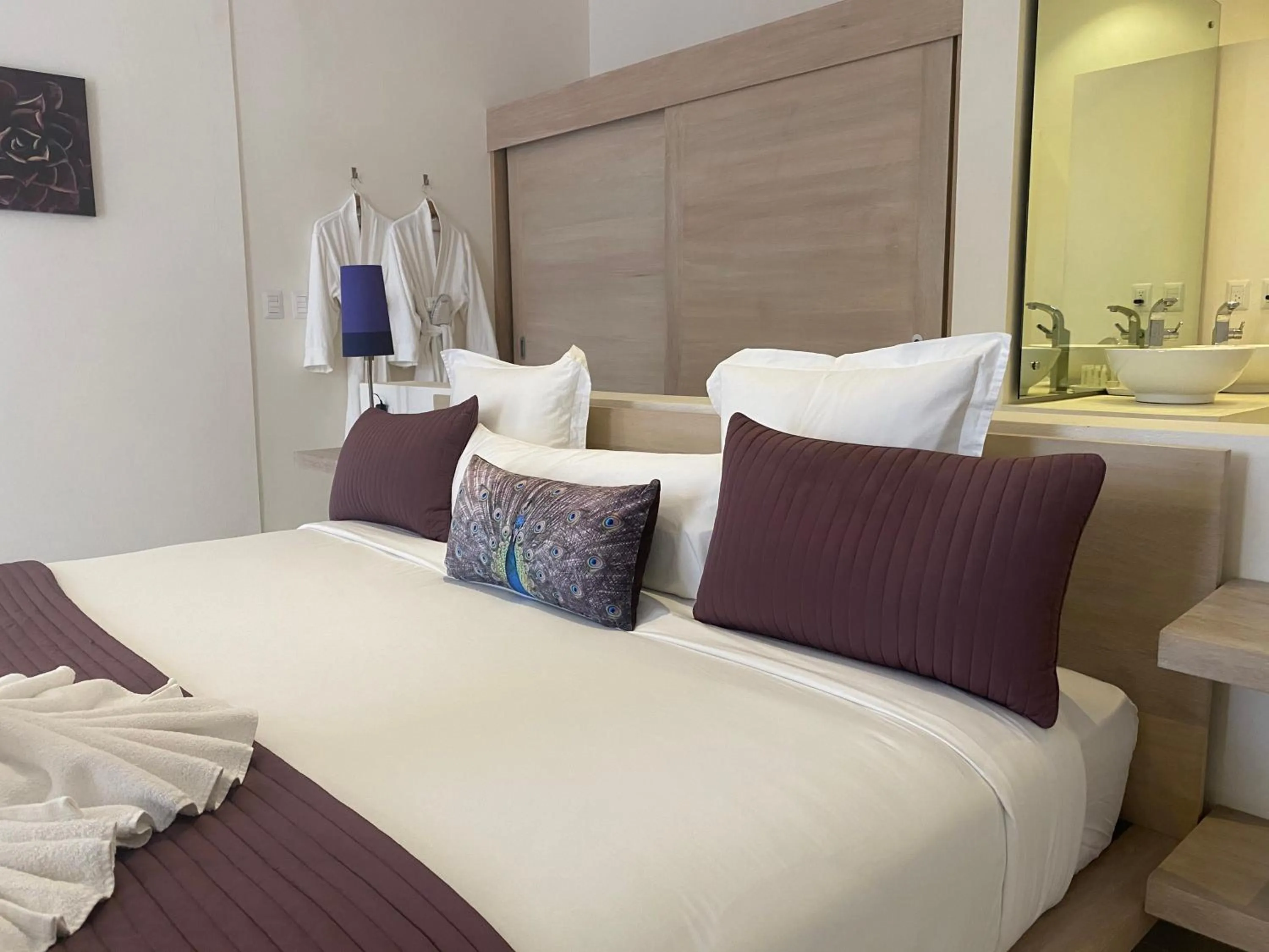 Bed in CASA-22 Luxury Boutique Hotel