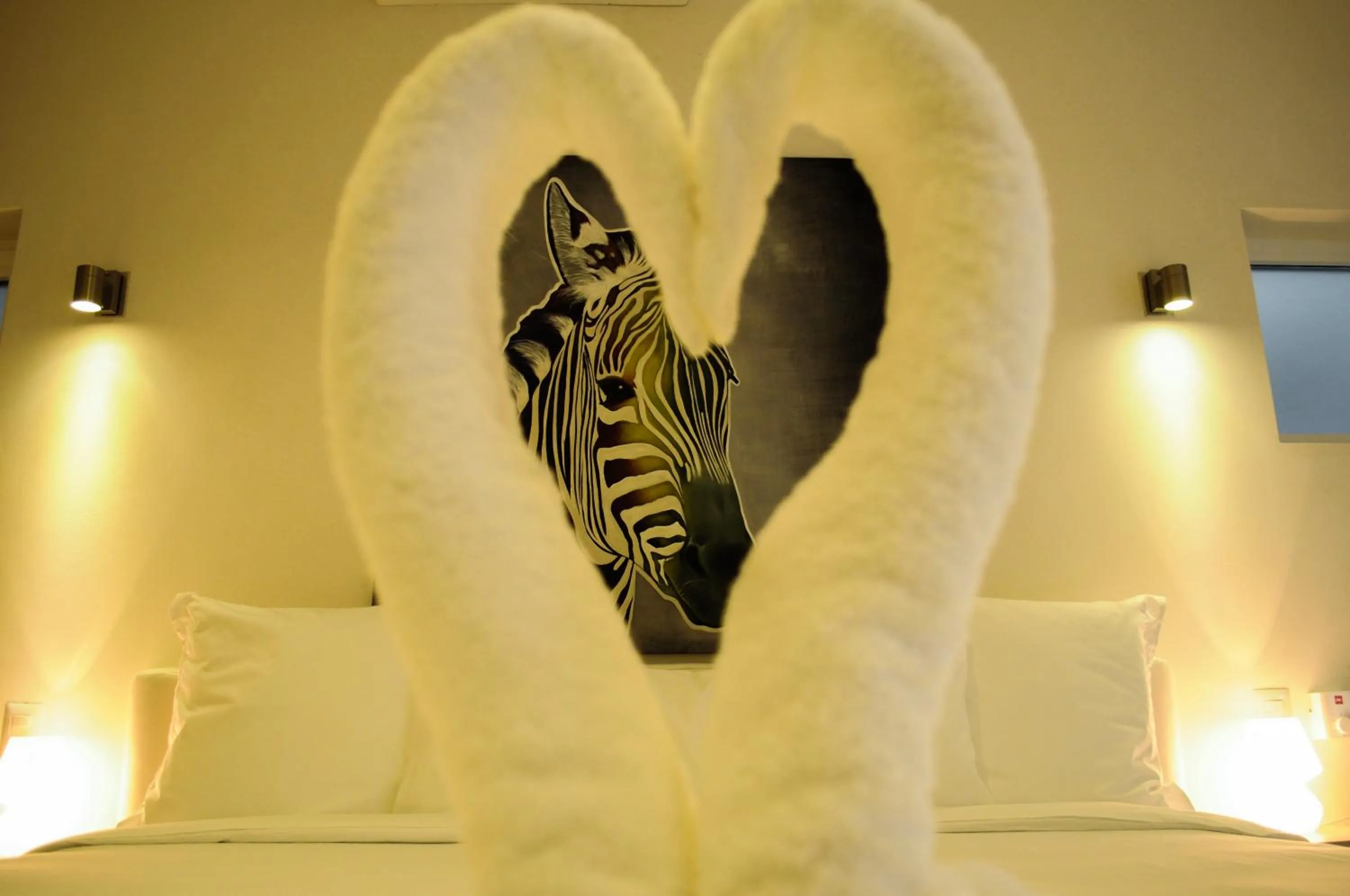 Bed in CASA-22 Luxury Boutique Hotel