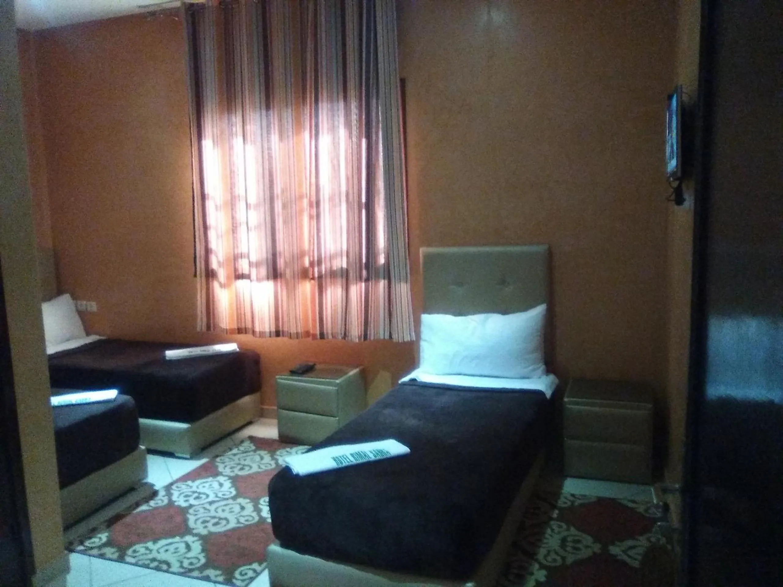 Bed in Hotel Rimal Sahara