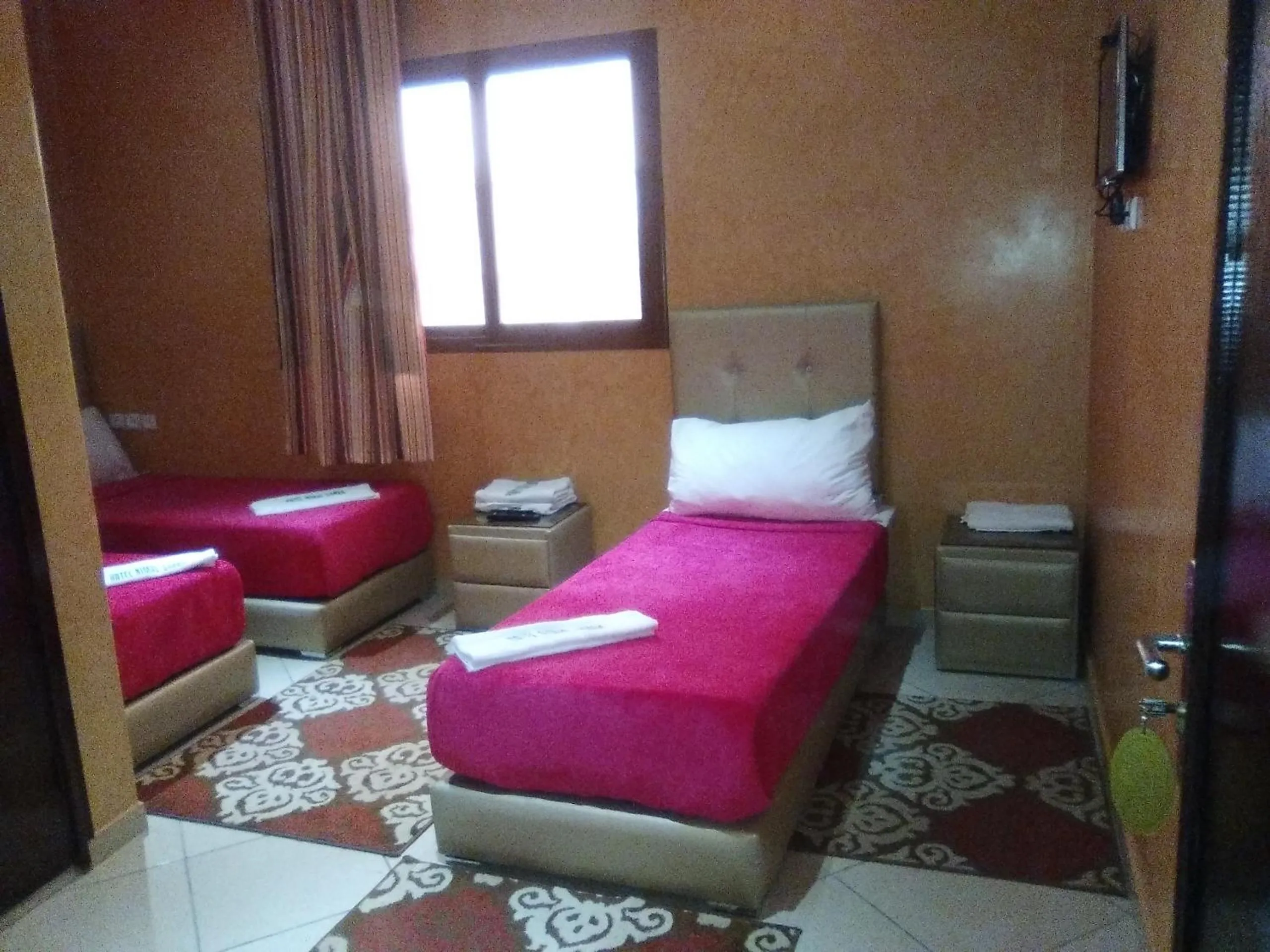 Bed in Hotel Rimal Sahara