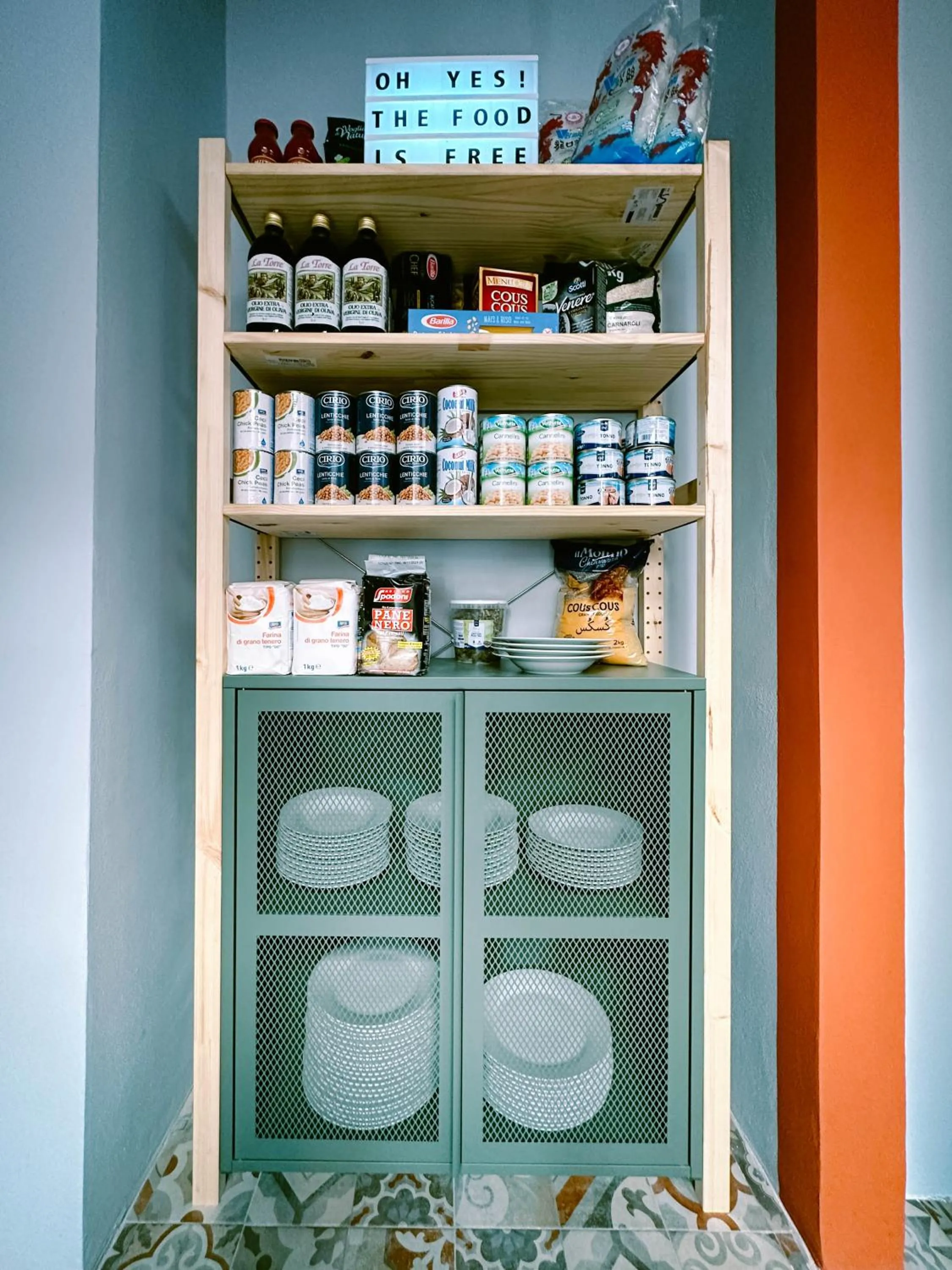 Communal kitchen in Hotel Bello by Ostello Bello