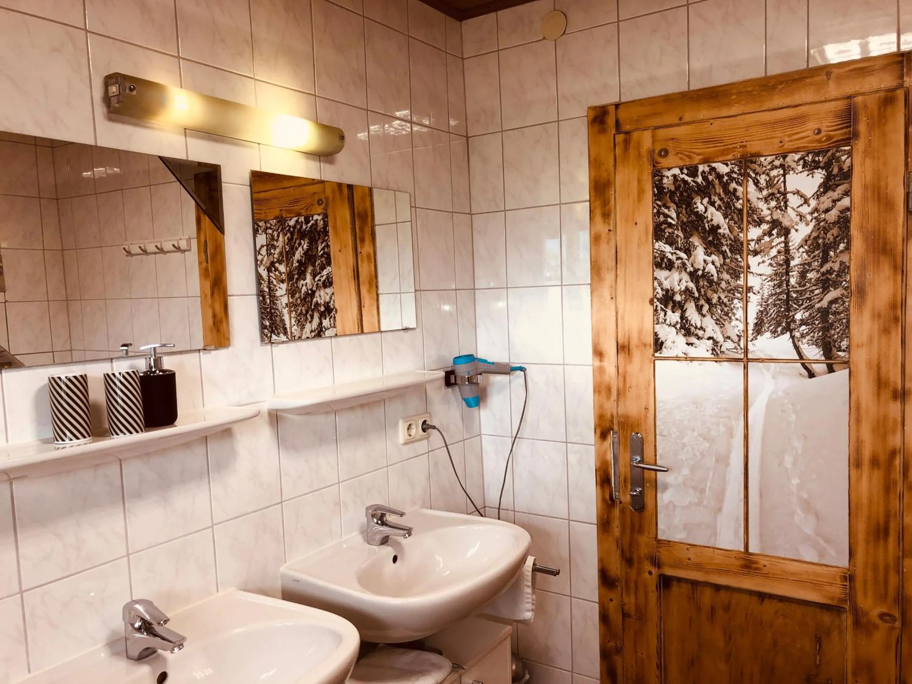 Bathroom in Familienappartements Eder - Free entry to Tauern SPA Kaprun included