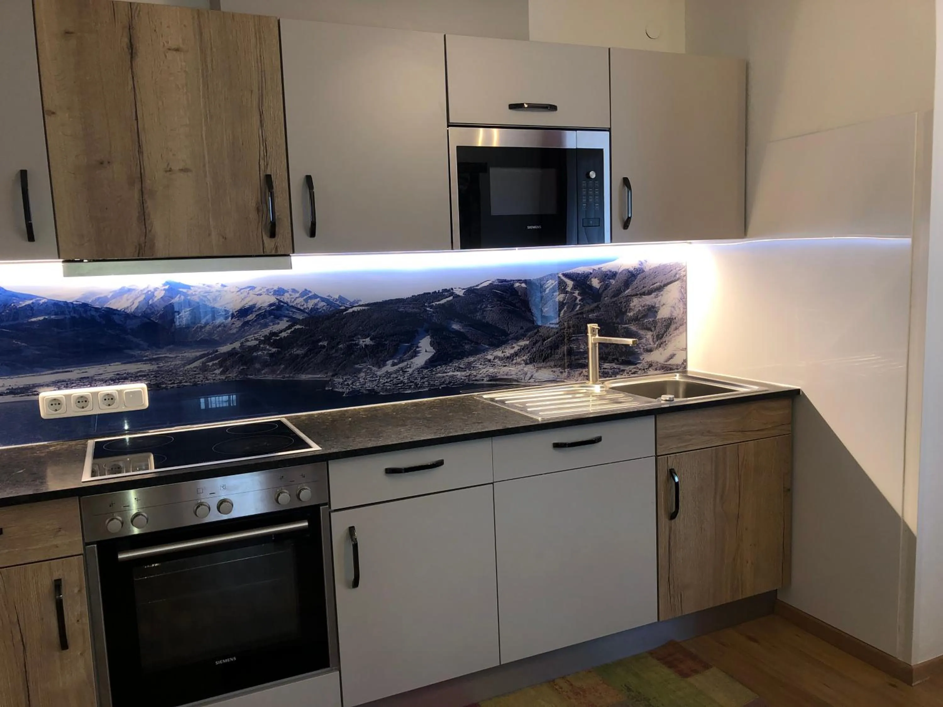 Kitchen or kitchenette in Familienappartements Eder - Free entry to Tauern SPA Kaprun included