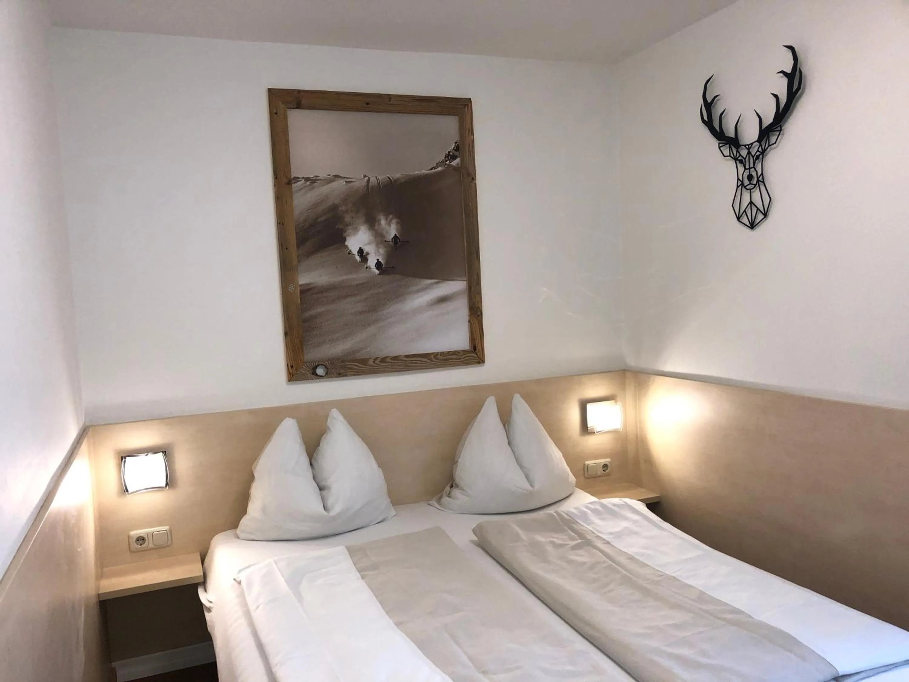 Bedroom, Bed in Familienappartements Eder - Free entry to Tauern SPA Kaprun included