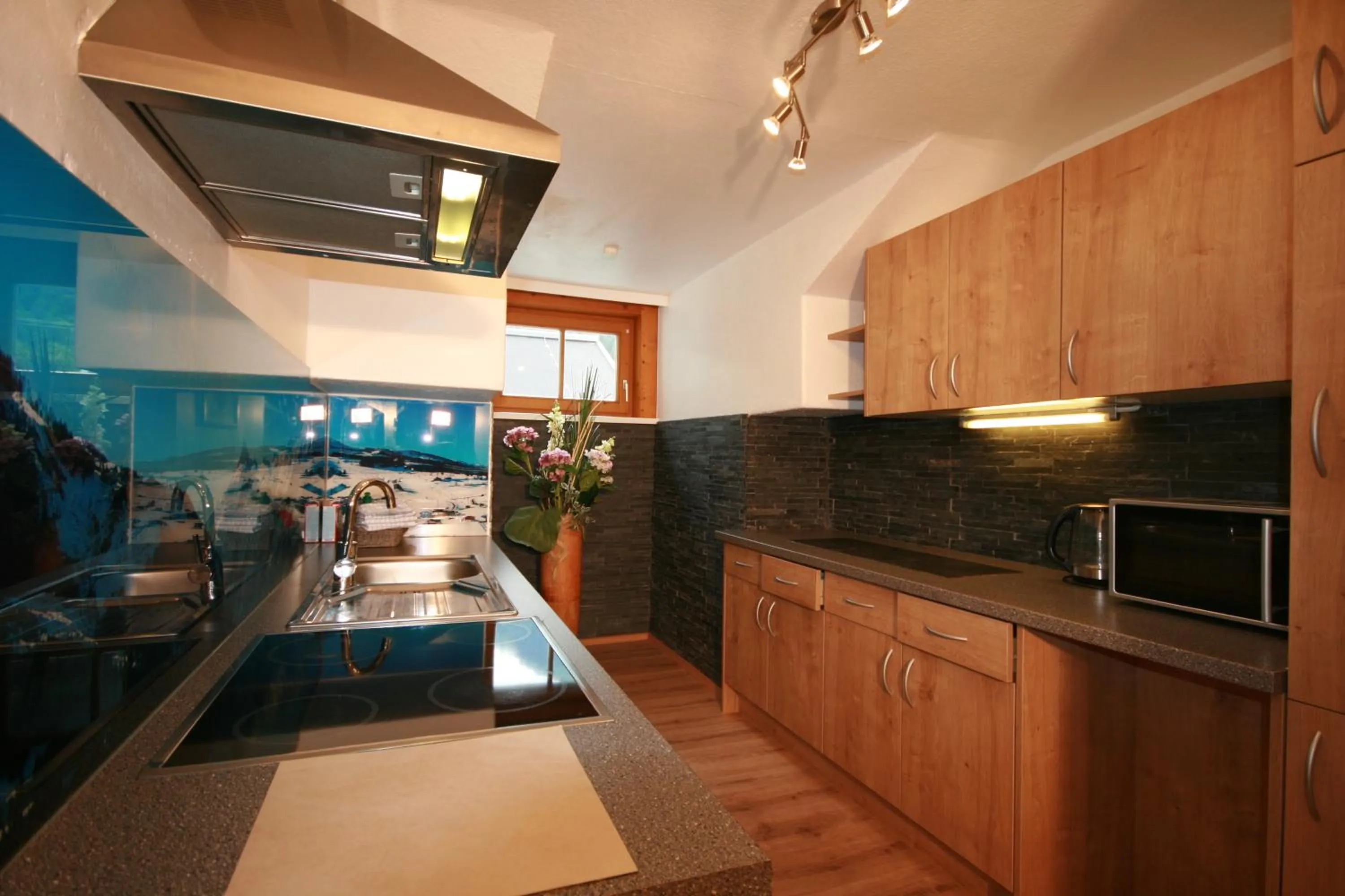 Kitchen or kitchenette in Familienappartements Eder - Free entry to Tauern SPA Kaprun included