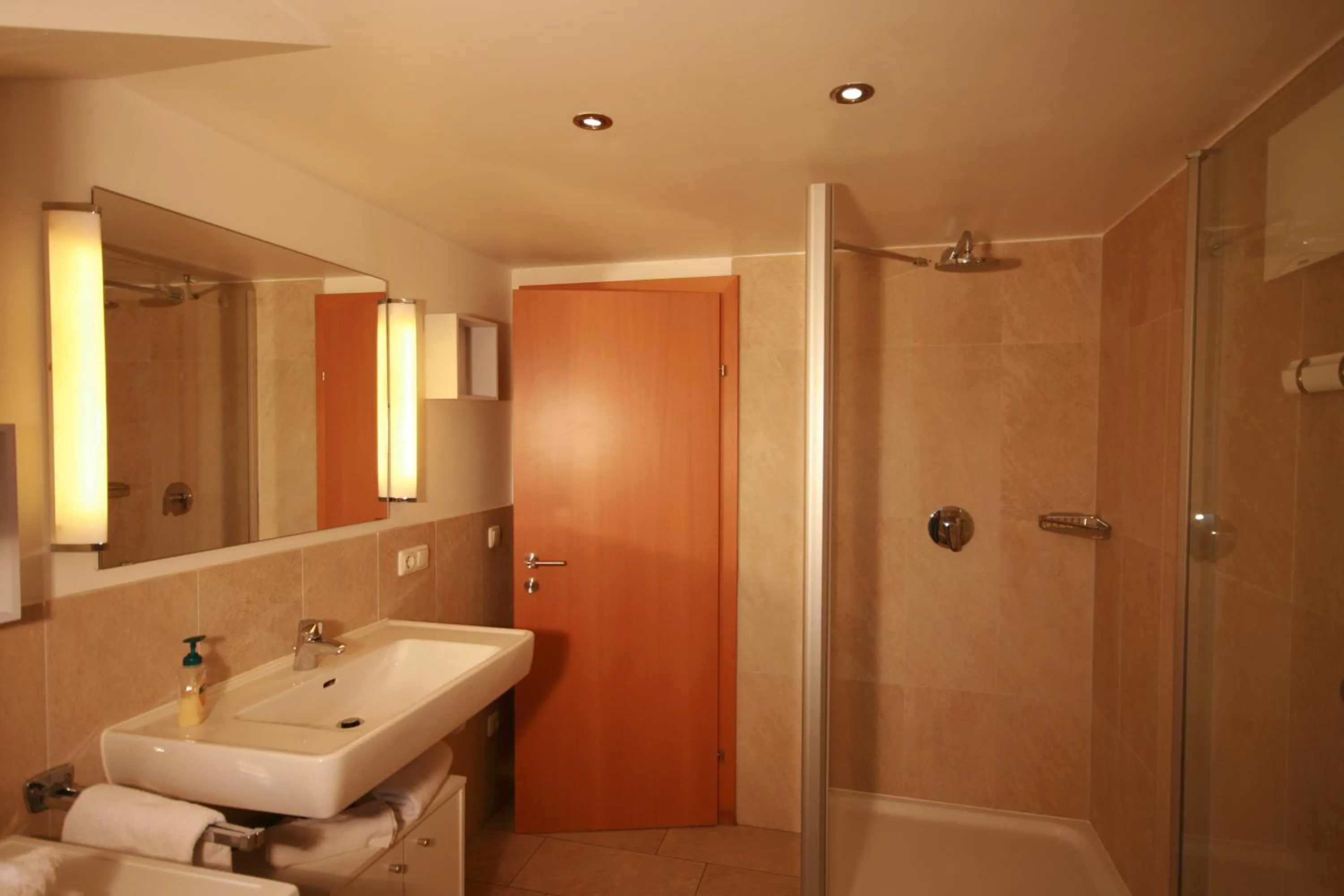 Bathroom in Familienappartements Eder - Free entry to Tauern SPA Kaprun included