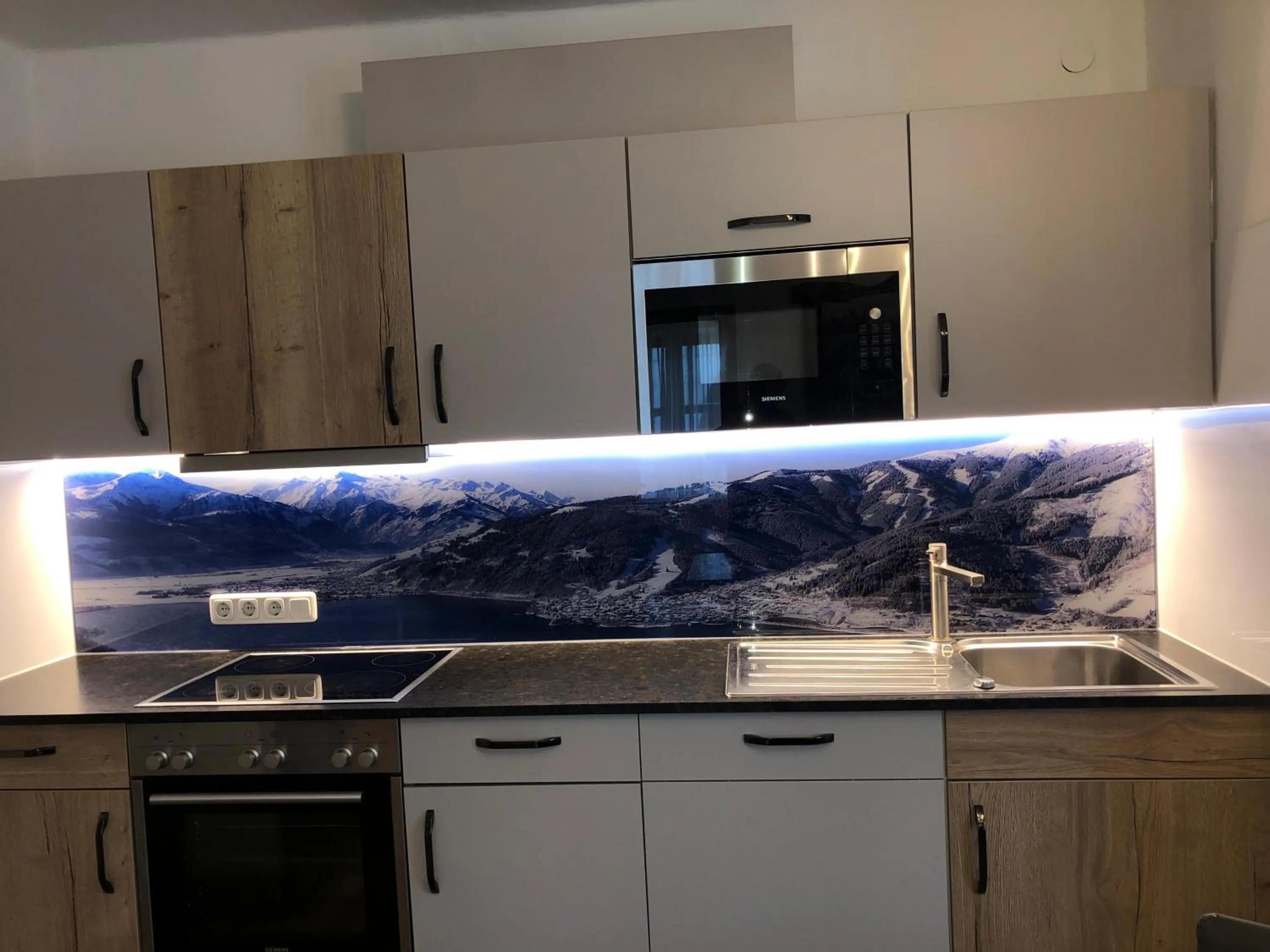 Kitchen or kitchenette in Familienappartements Eder - Free entry to Tauern SPA Kaprun included