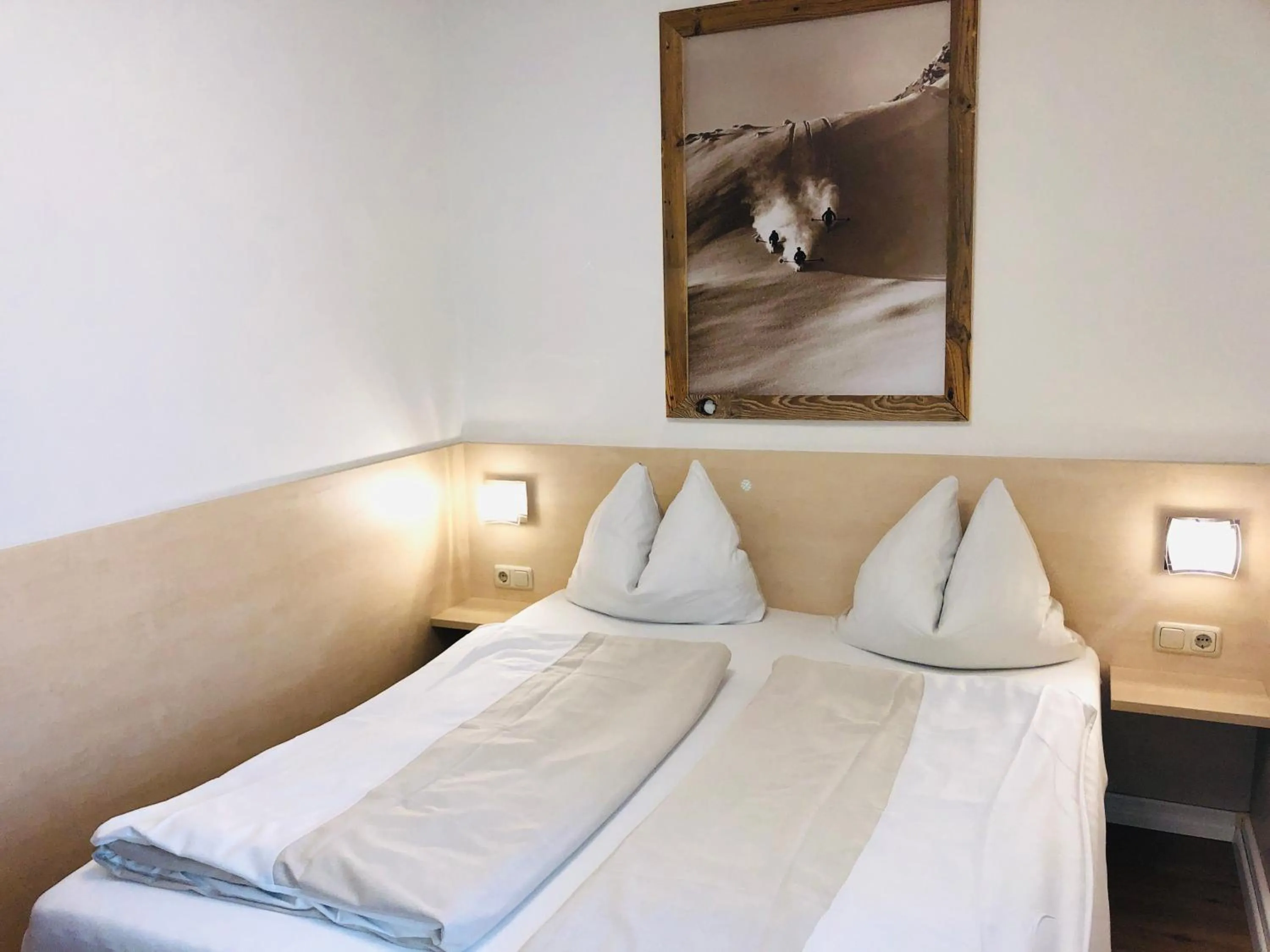 Bedroom, Bed in Familienappartements Eder - Free entry to Tauern SPA Kaprun included