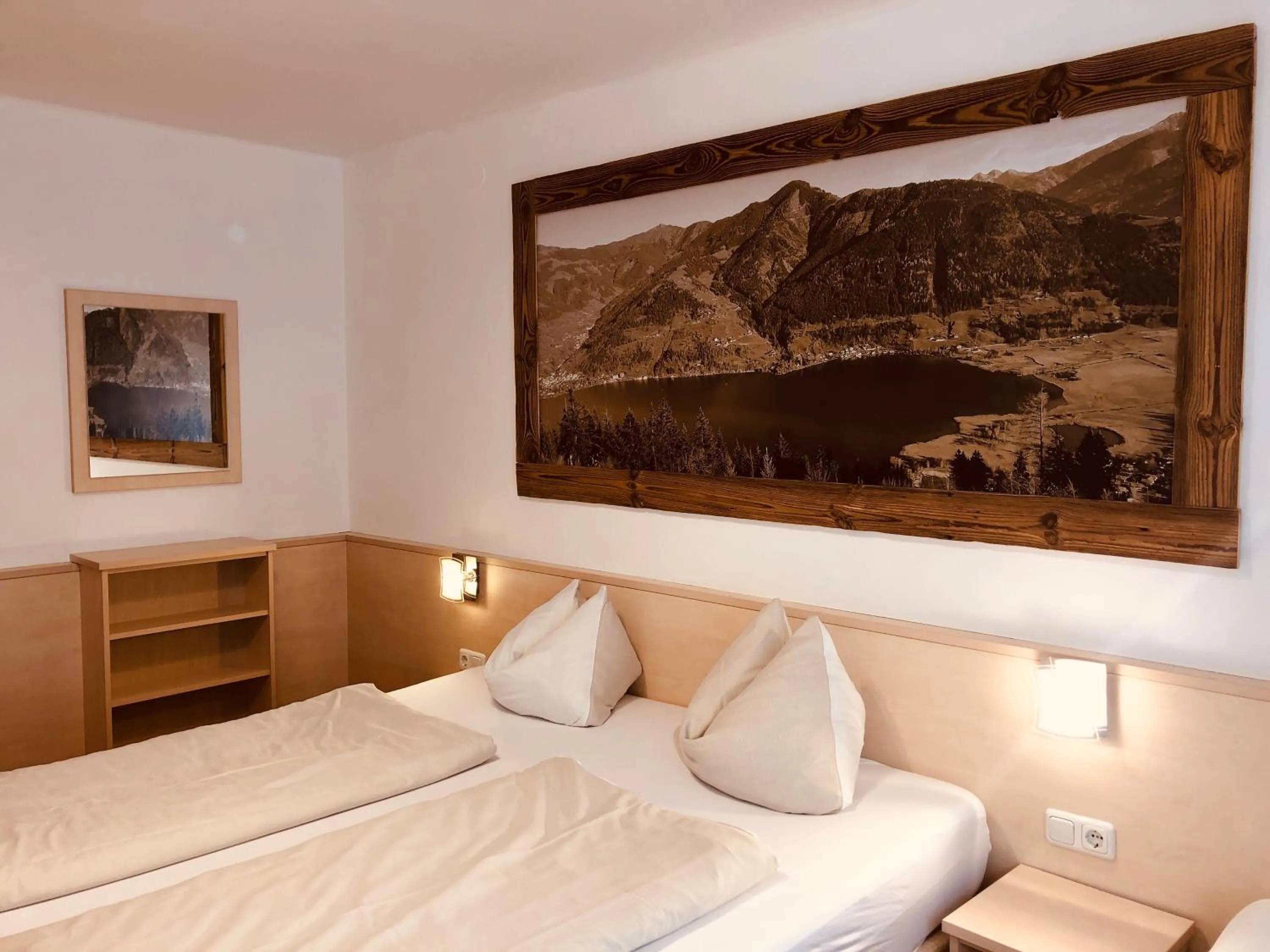 Bedroom, Bed in Familienappartements Eder - Free entry to Tauern SPA Kaprun included