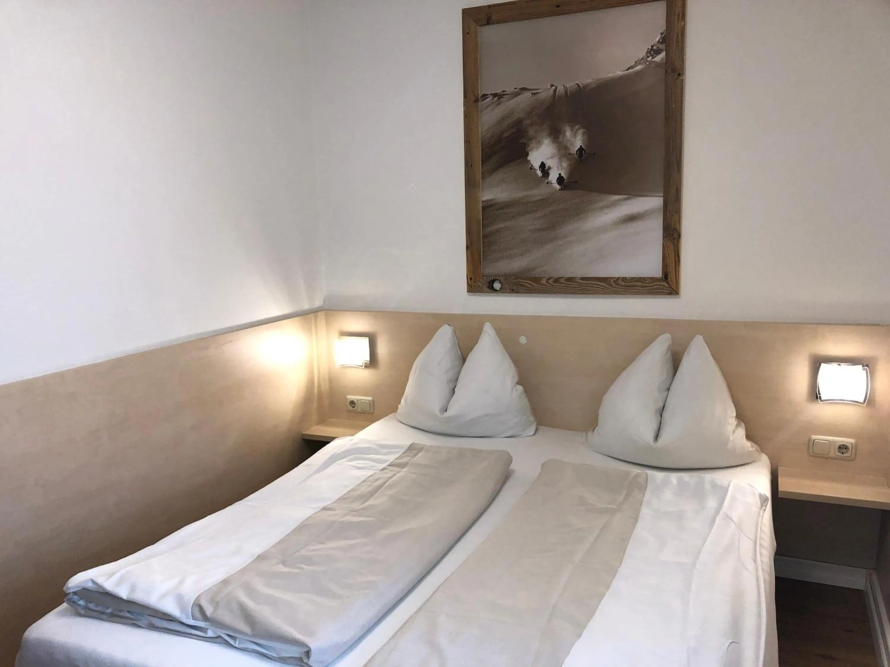 Bedroom, Bed in Familienappartements Eder - Free entry to Tauern SPA Kaprun included