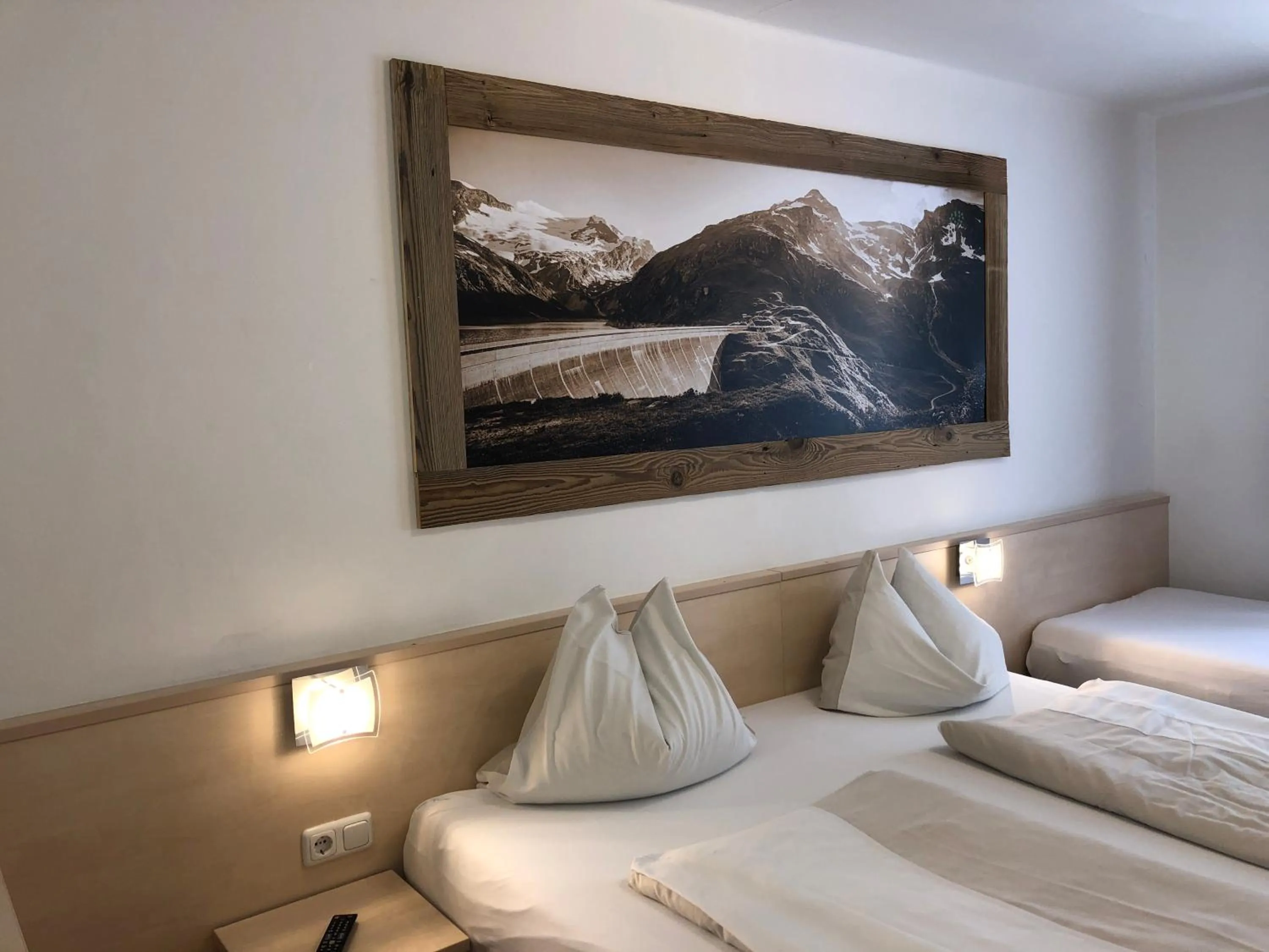 Bedroom, Bed in Familienappartements Eder - Free entry to Tauern SPA Kaprun included