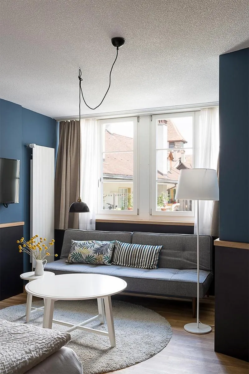 Living room, Bed in ADLER Boutique Hotel