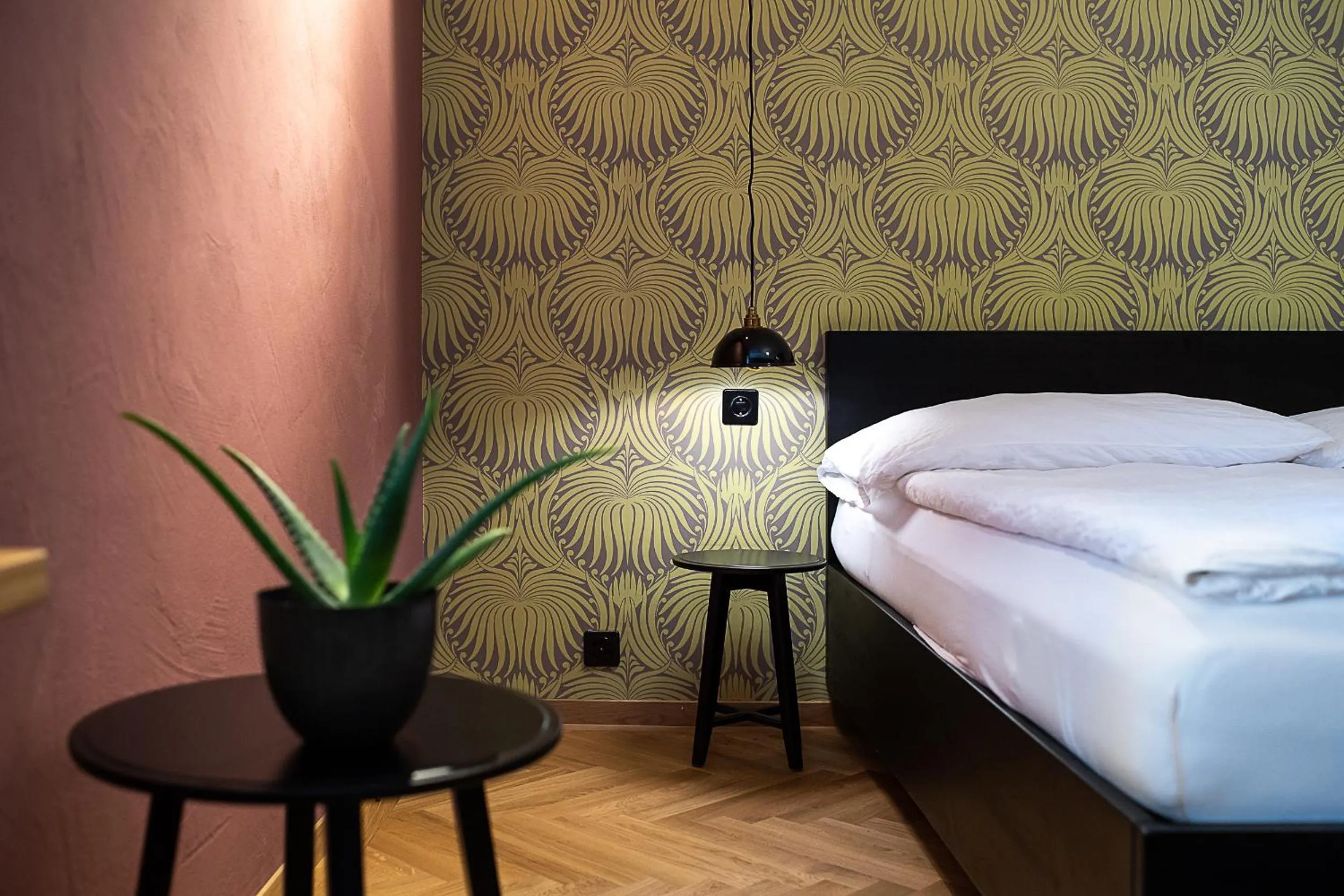 Bed in ADLER Boutique Hotel