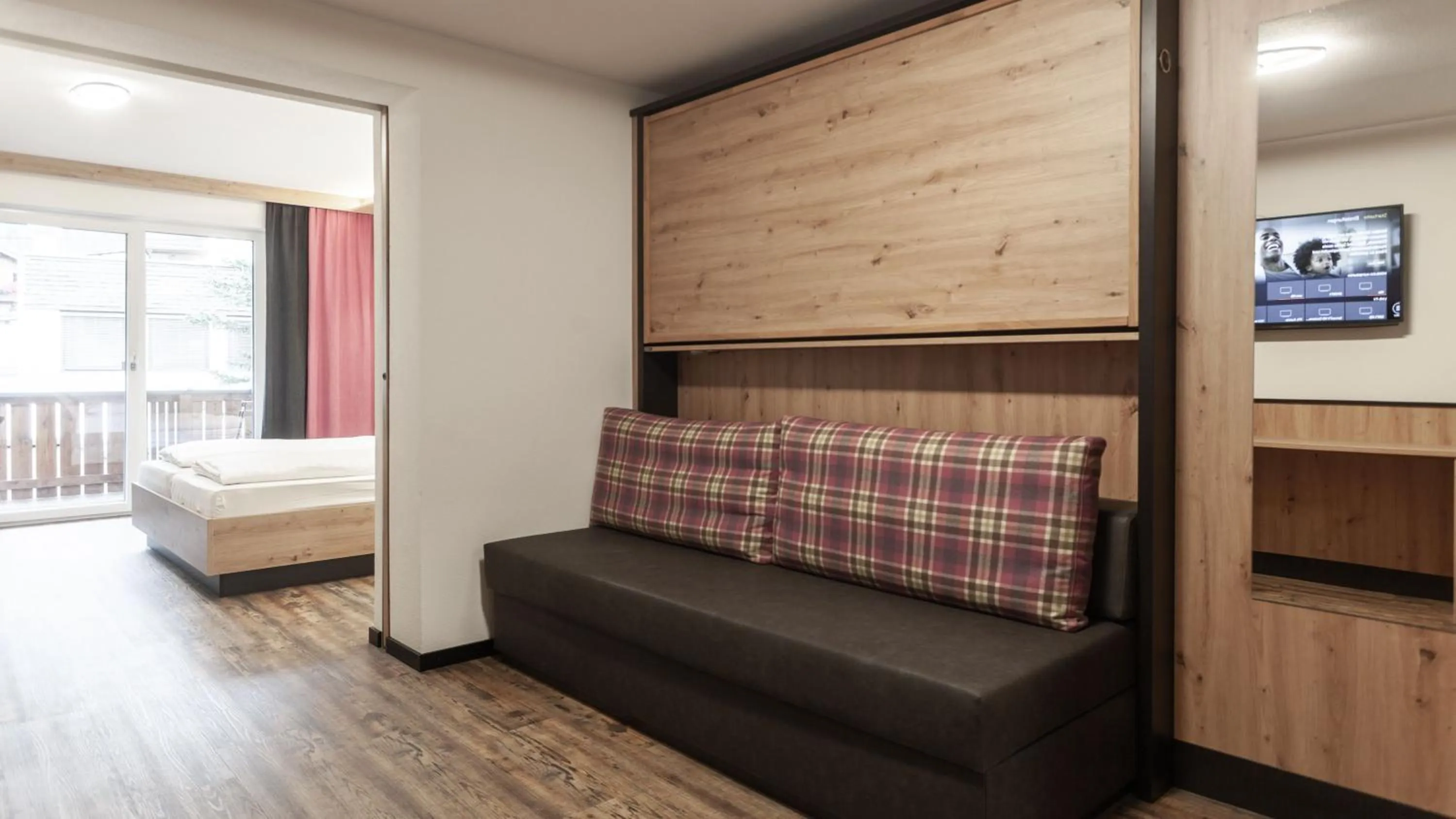 Photo of the whole room, Bed in first mountain Hotel Ötztal