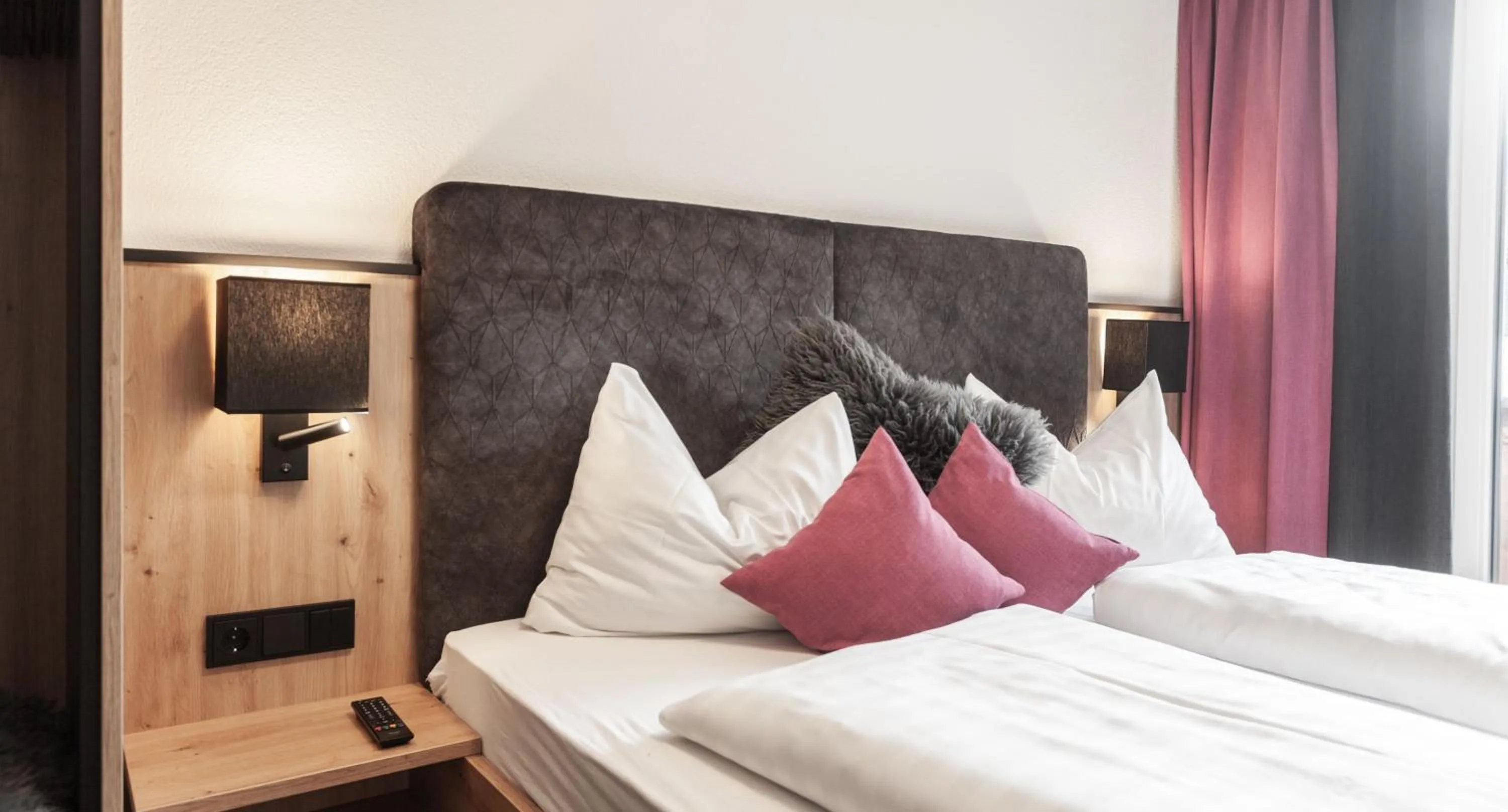 Photo of the whole room, Bed in first mountain Hotel Ötztal