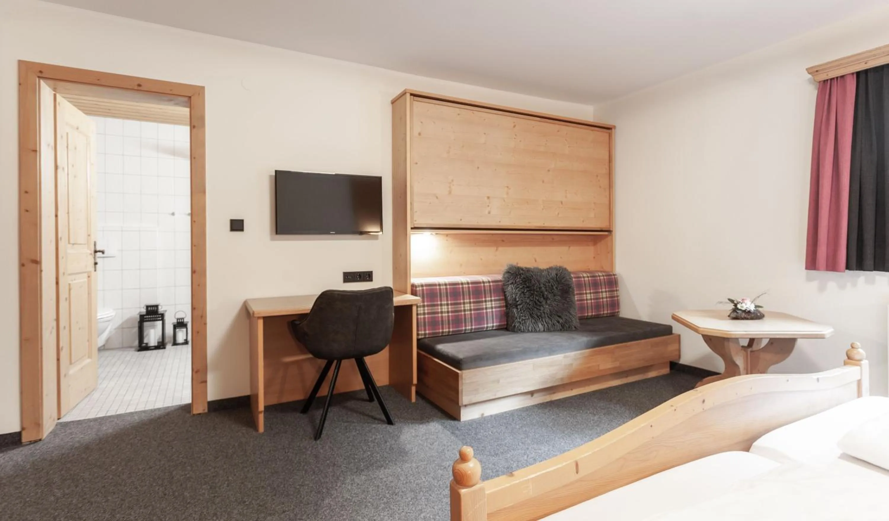 Photo of the whole room, Bed in first mountain Hotel Ötztal