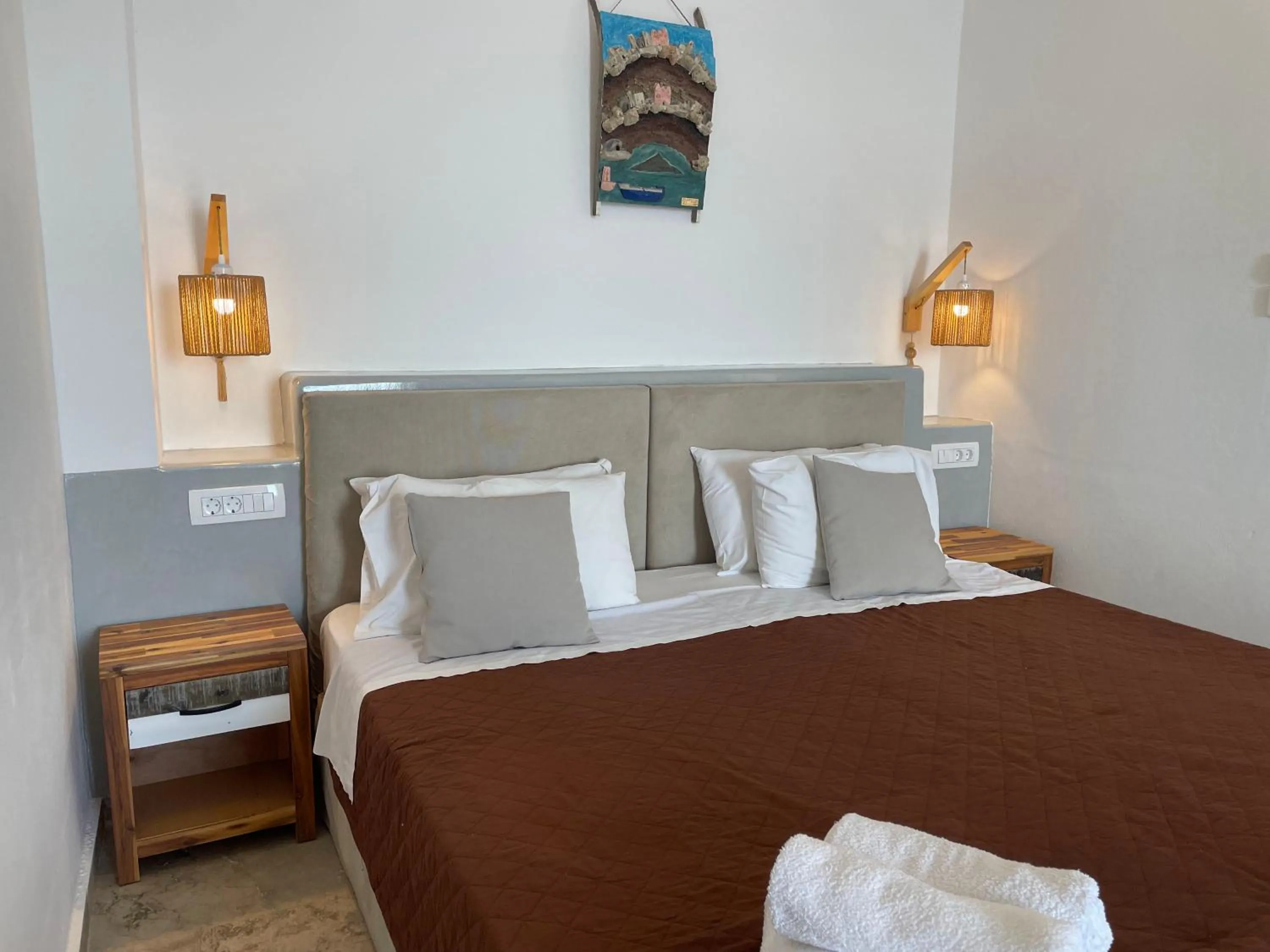 Decorative detail, Bed in Kokkinos Villas