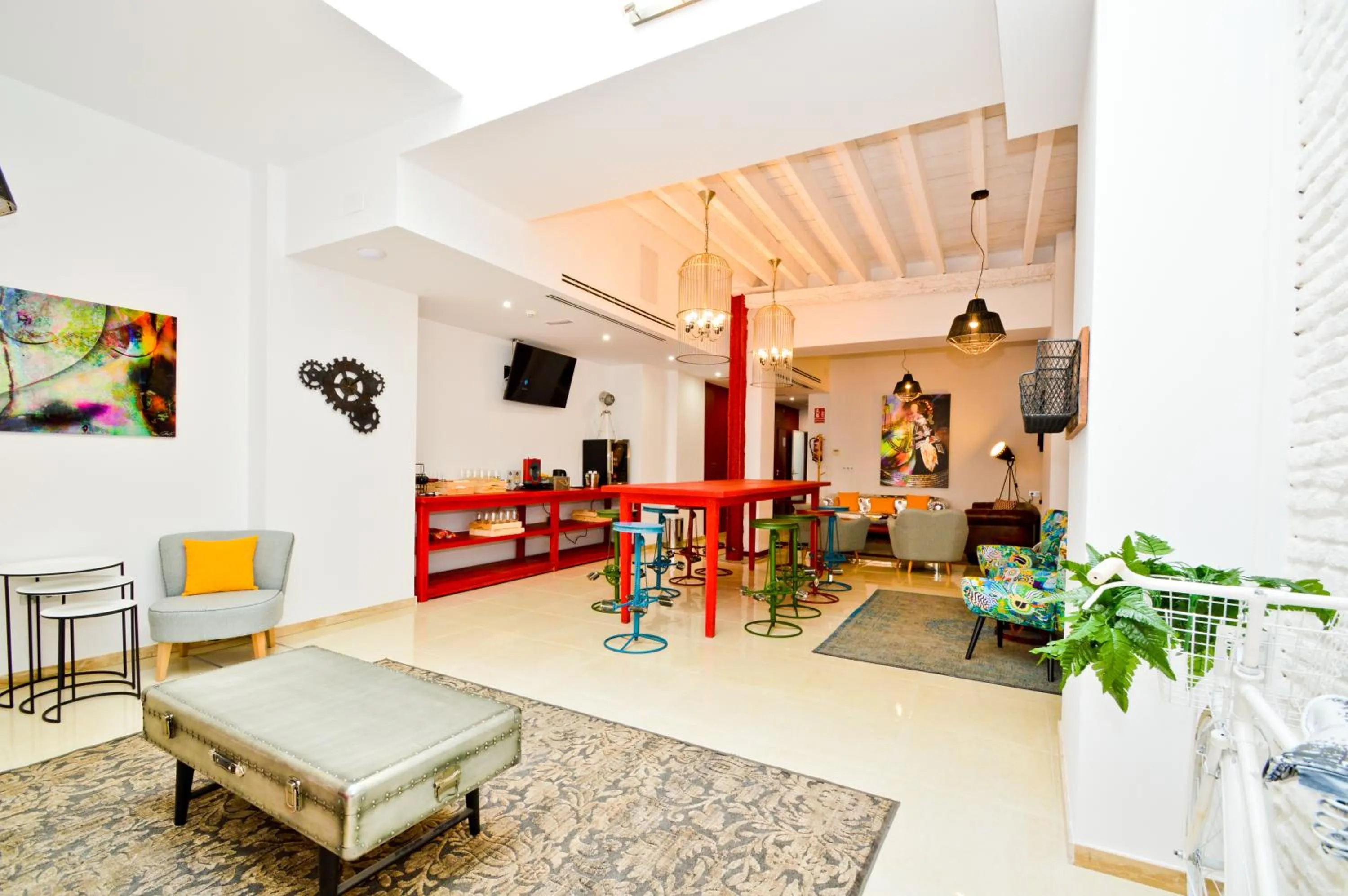 Communal lounge/ TV room in The Zentral Arenal Suites