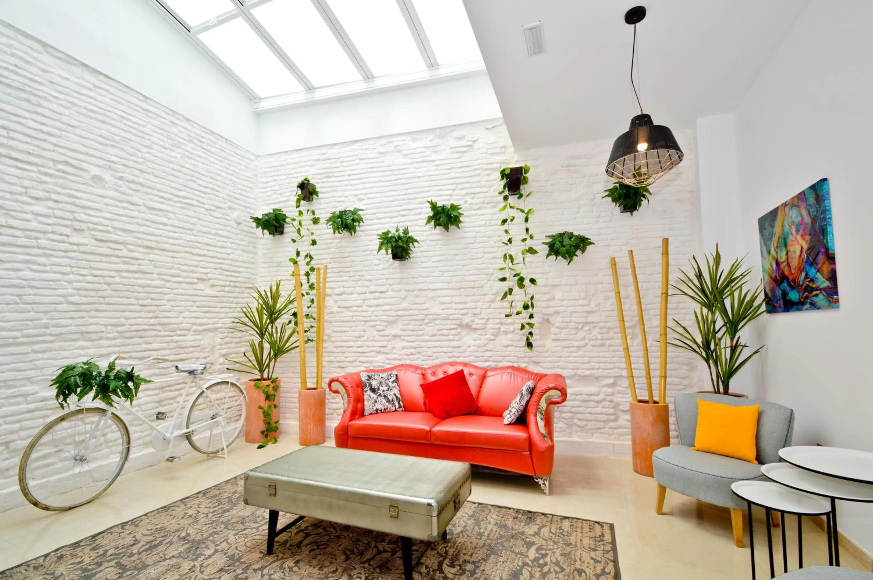 Communal lounge/ TV room in The Zentral Arenal Suites