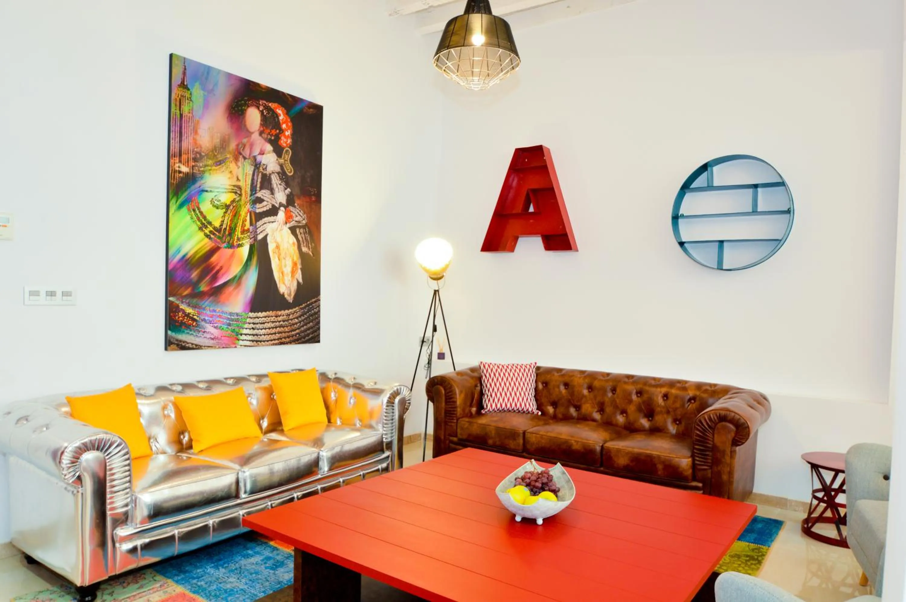 Communal lounge/ TV room in The Zentral Arenal Suites