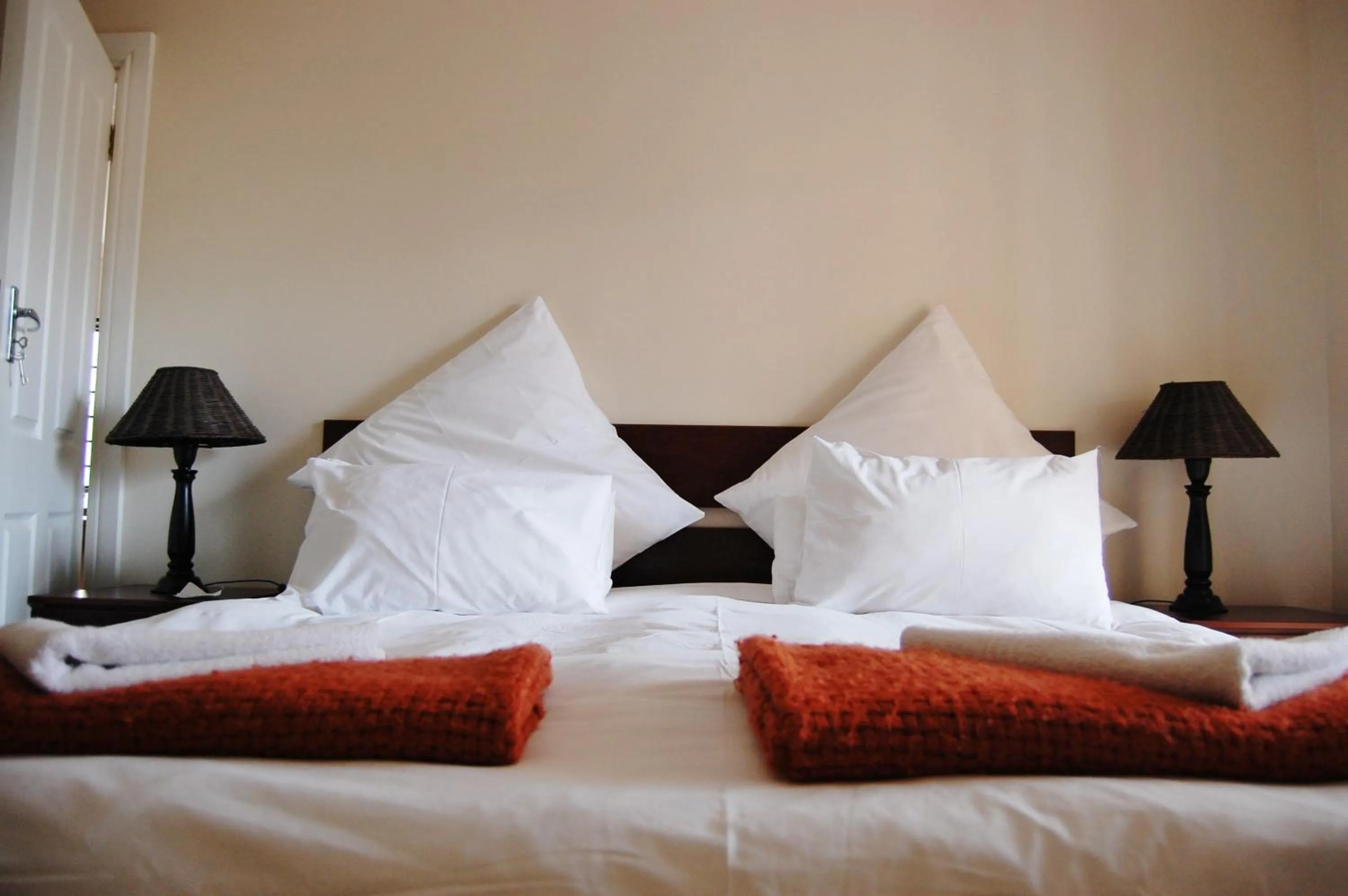 Bed in Fourteenth Green Guest Lodge