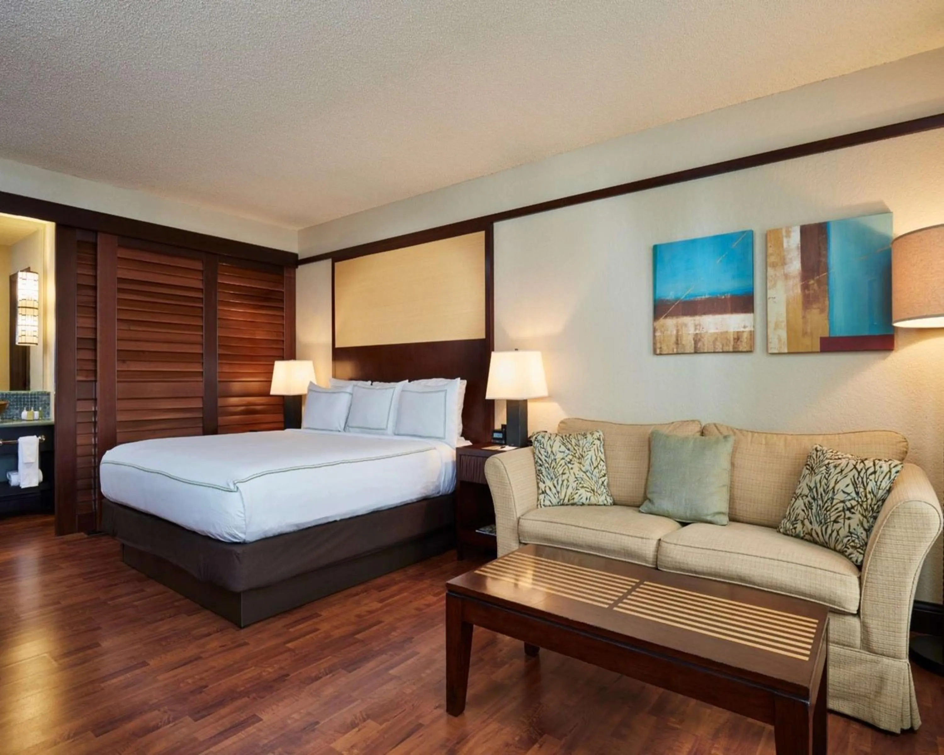 Living room, Bed in DoubleTree by Hilton Hotel Orlando at SeaWorld