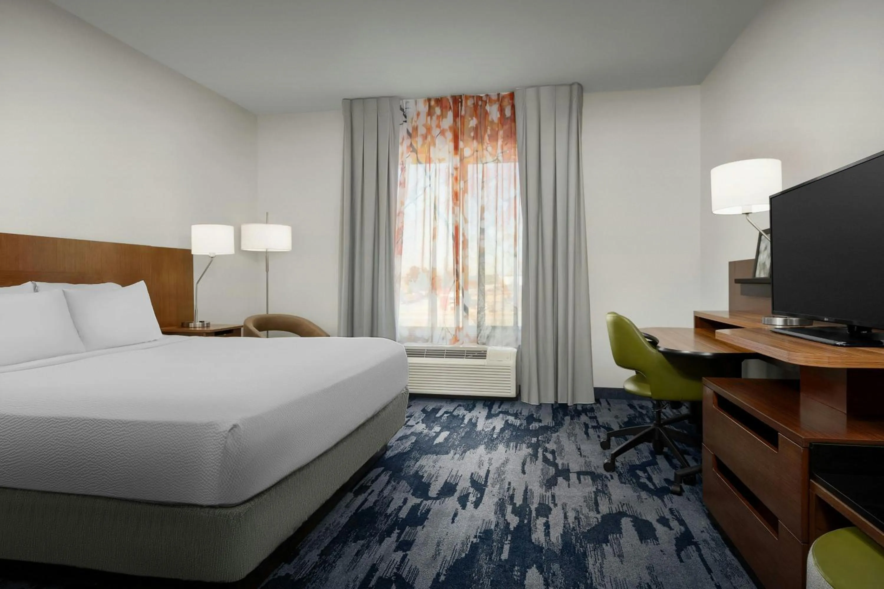 Photo of the whole room, Bed in Fairfield Inn & Suites by Marriott Atlanta Stockbridge