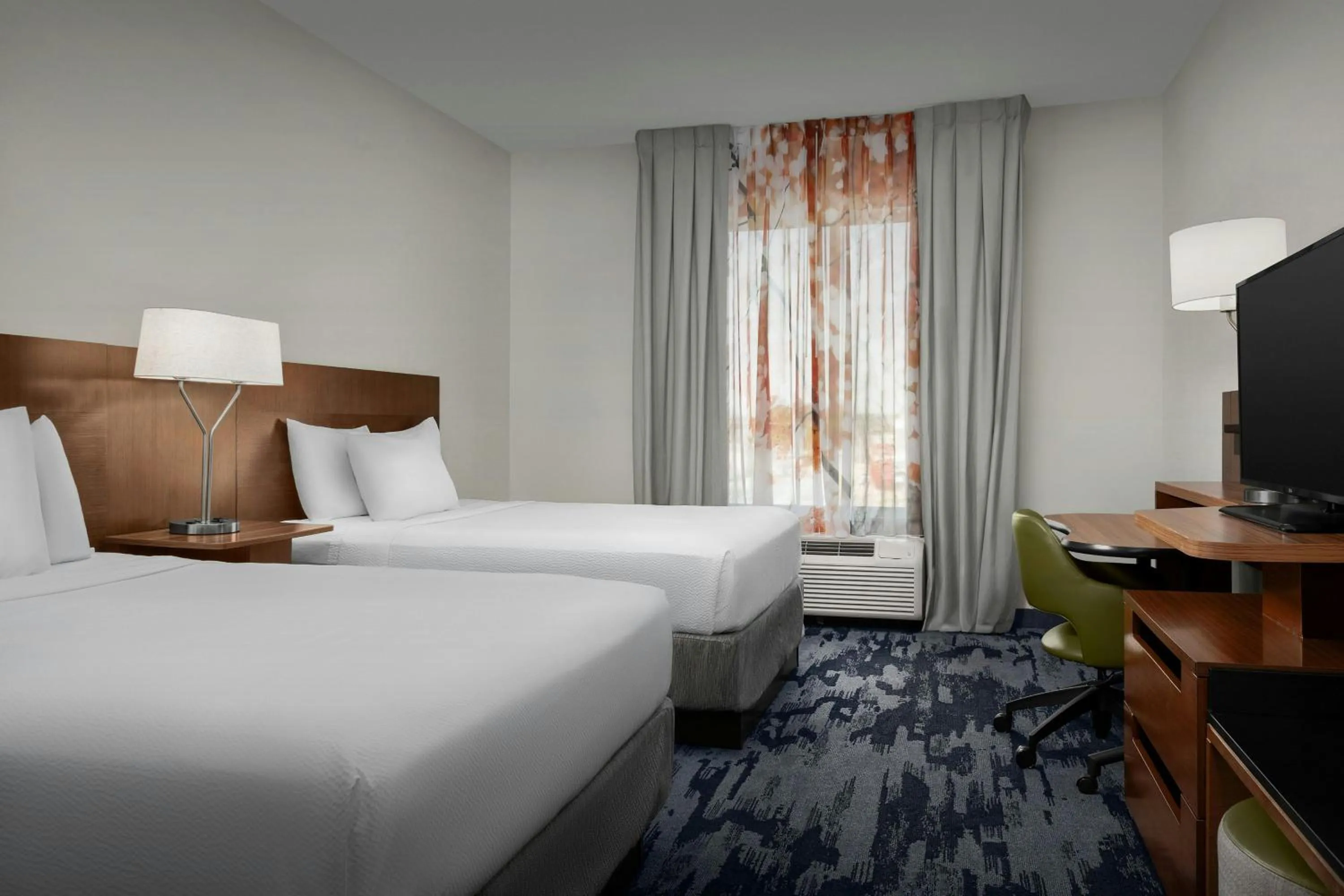 Photo of the whole room, Bed in Fairfield Inn & Suites by Marriott Atlanta Stockbridge