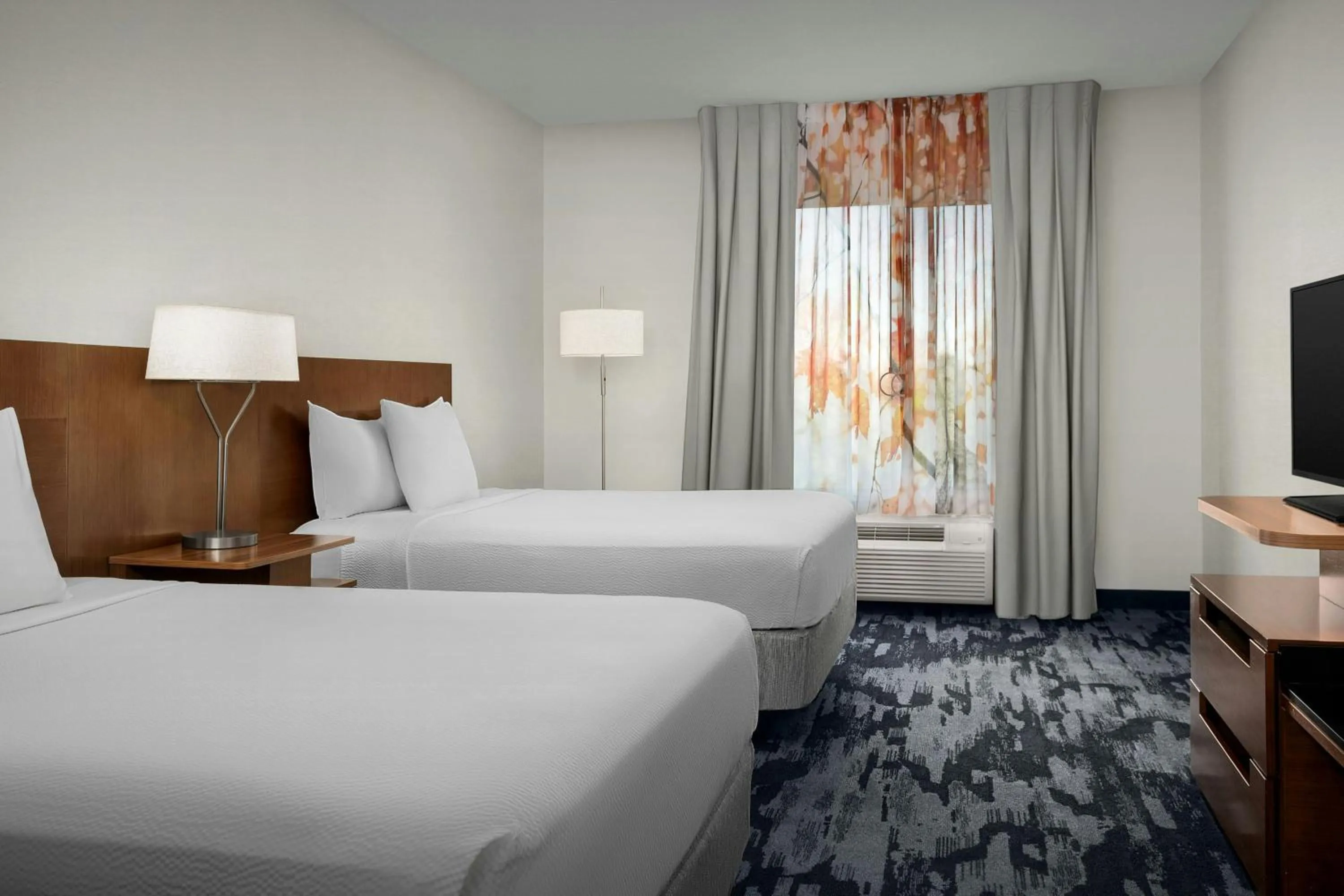 Photo of the whole room, Bed in Fairfield Inn & Suites by Marriott Atlanta Stockbridge