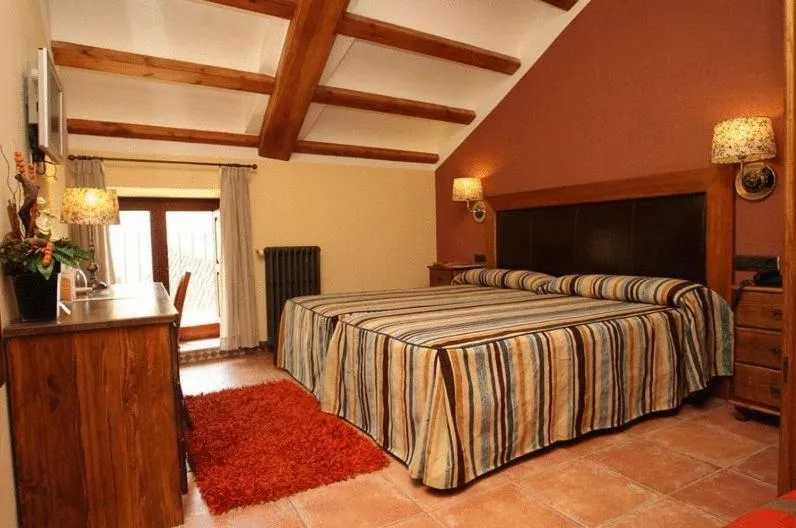 Photo of the whole room, Bed in Hotel Con Encanto La Façana