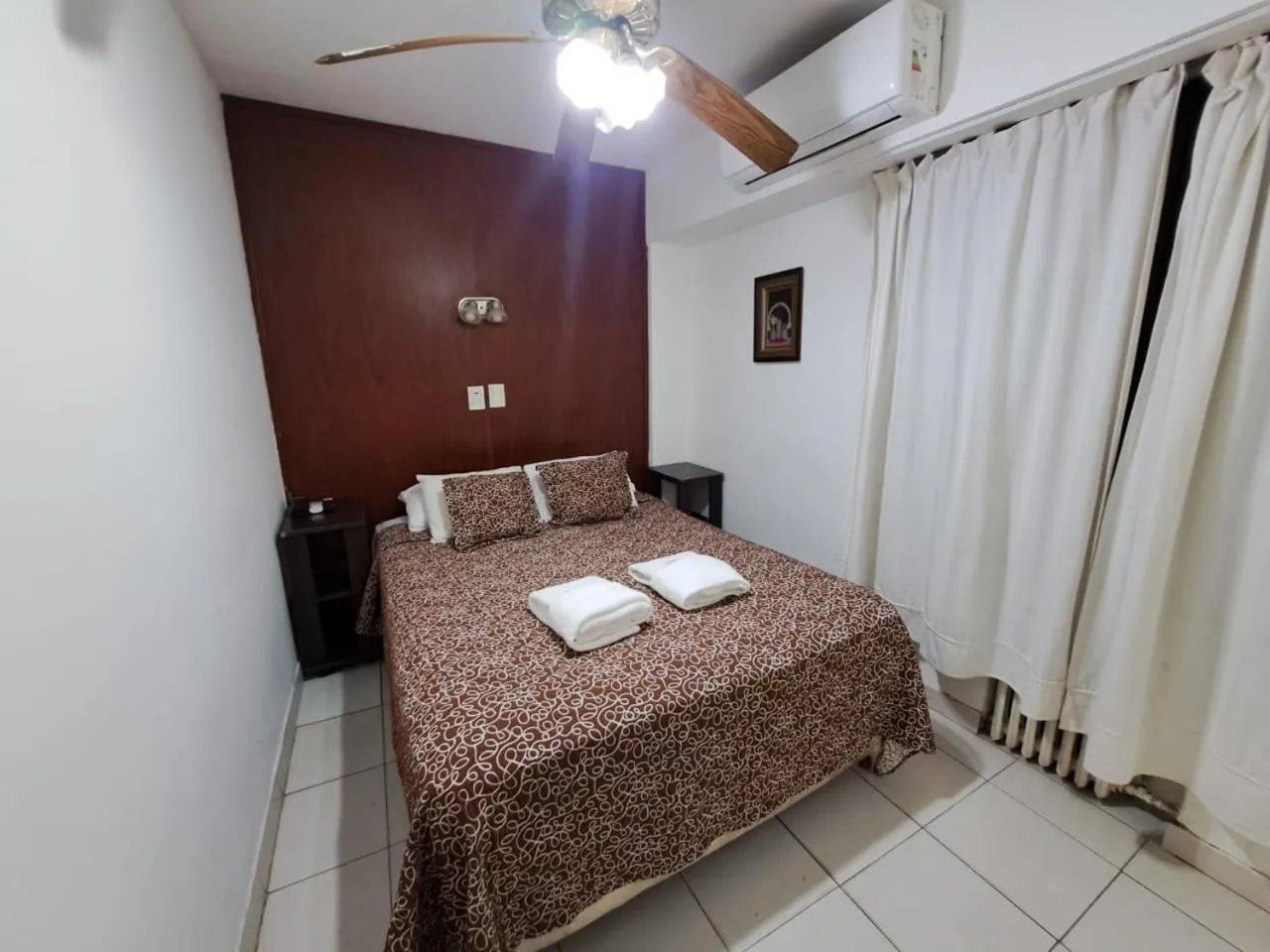 Bed in San Remo Grand Hotel